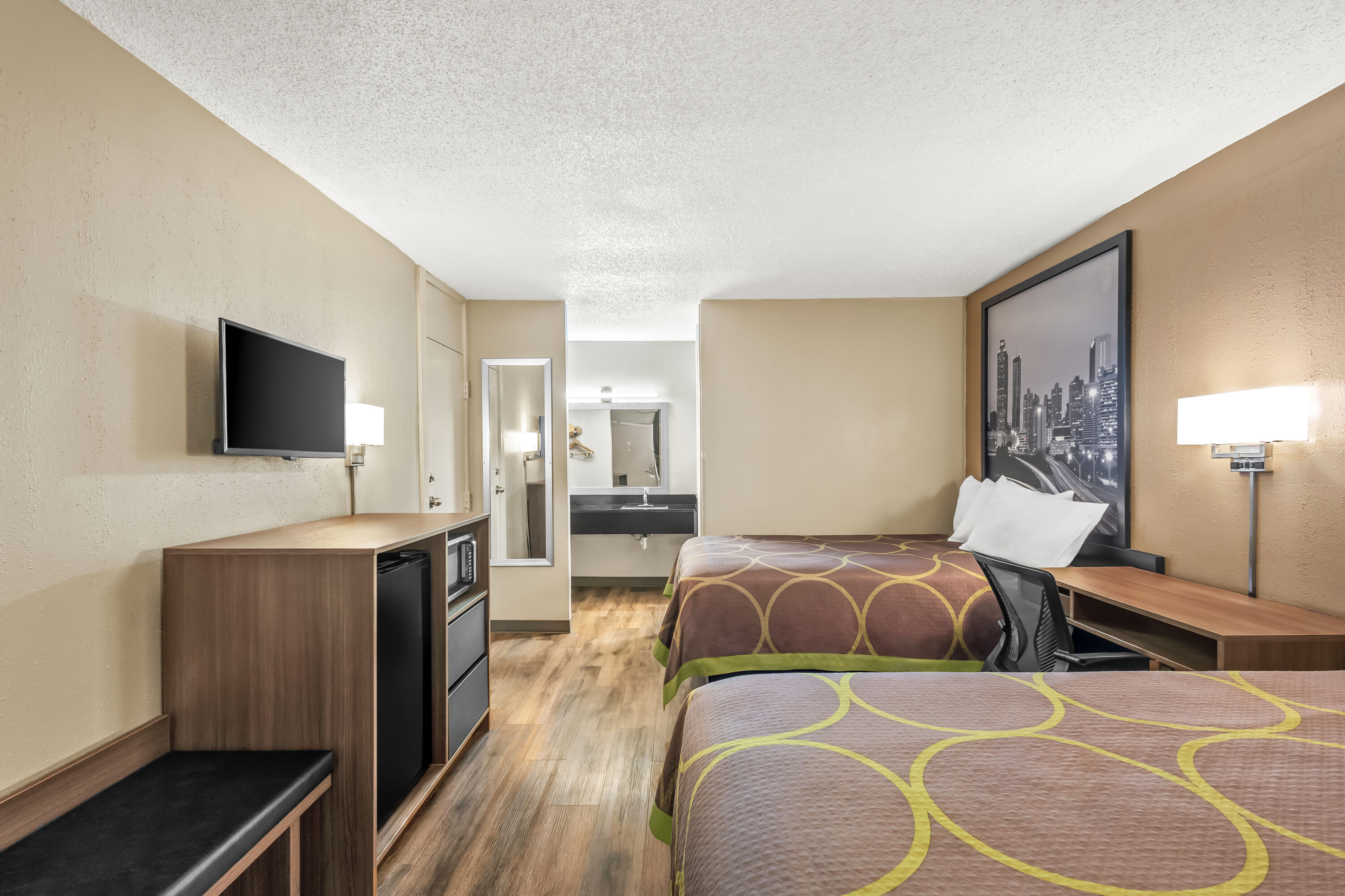 Double bed guest room at the Super 8 by Wyndham Commerce in Commerce, Georgia