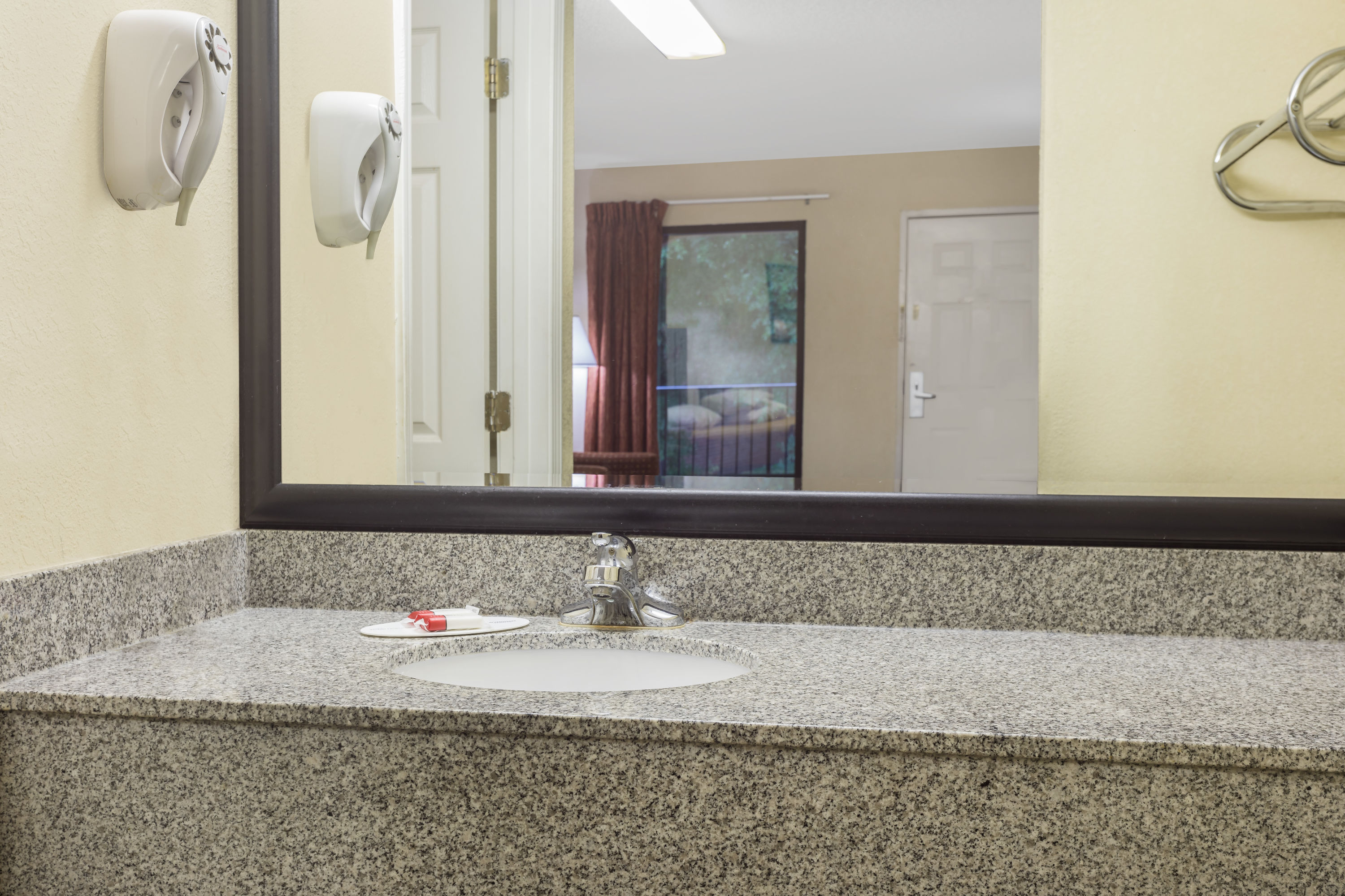 Guest room bath at the Super 8 by Wyndham Decatur/Lithonia/Atl Area in Decatur, Georgia