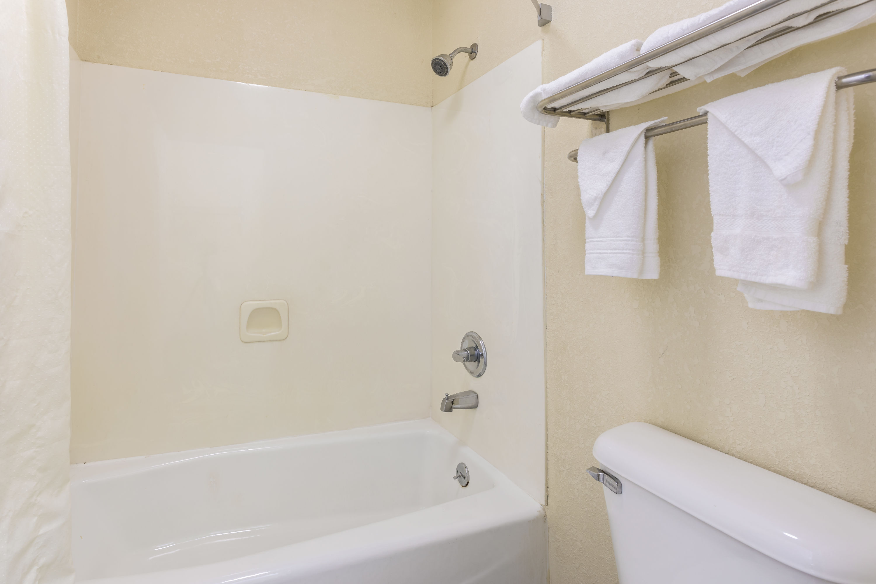 Guest room bath at the Super 8 by Wyndham Decatur/Lithonia/Atl Area in Decatur, Georgia