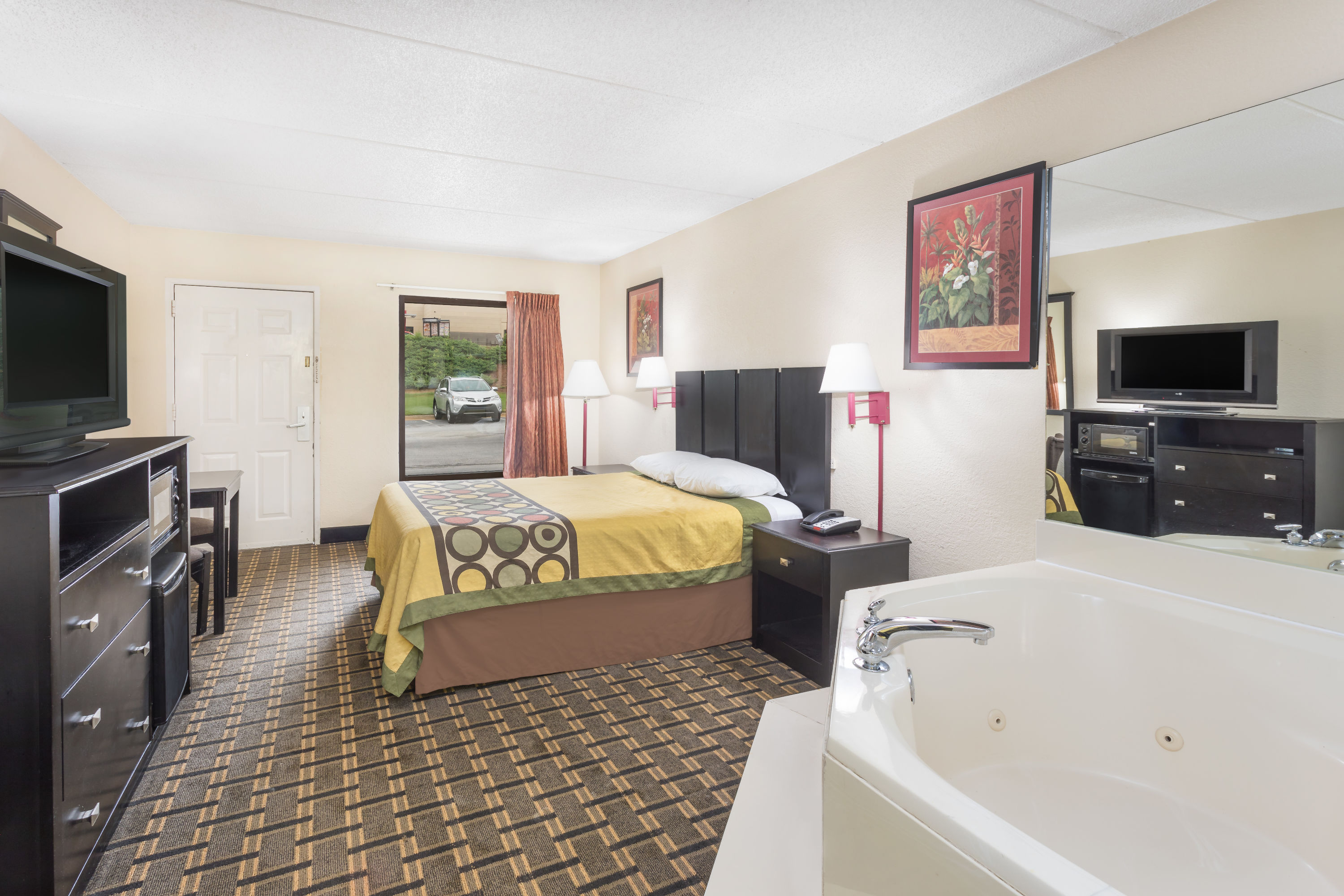 Guest room at the Super 8 by Wyndham Decatur/Lithonia/Atl Area in Decatur, Georgia