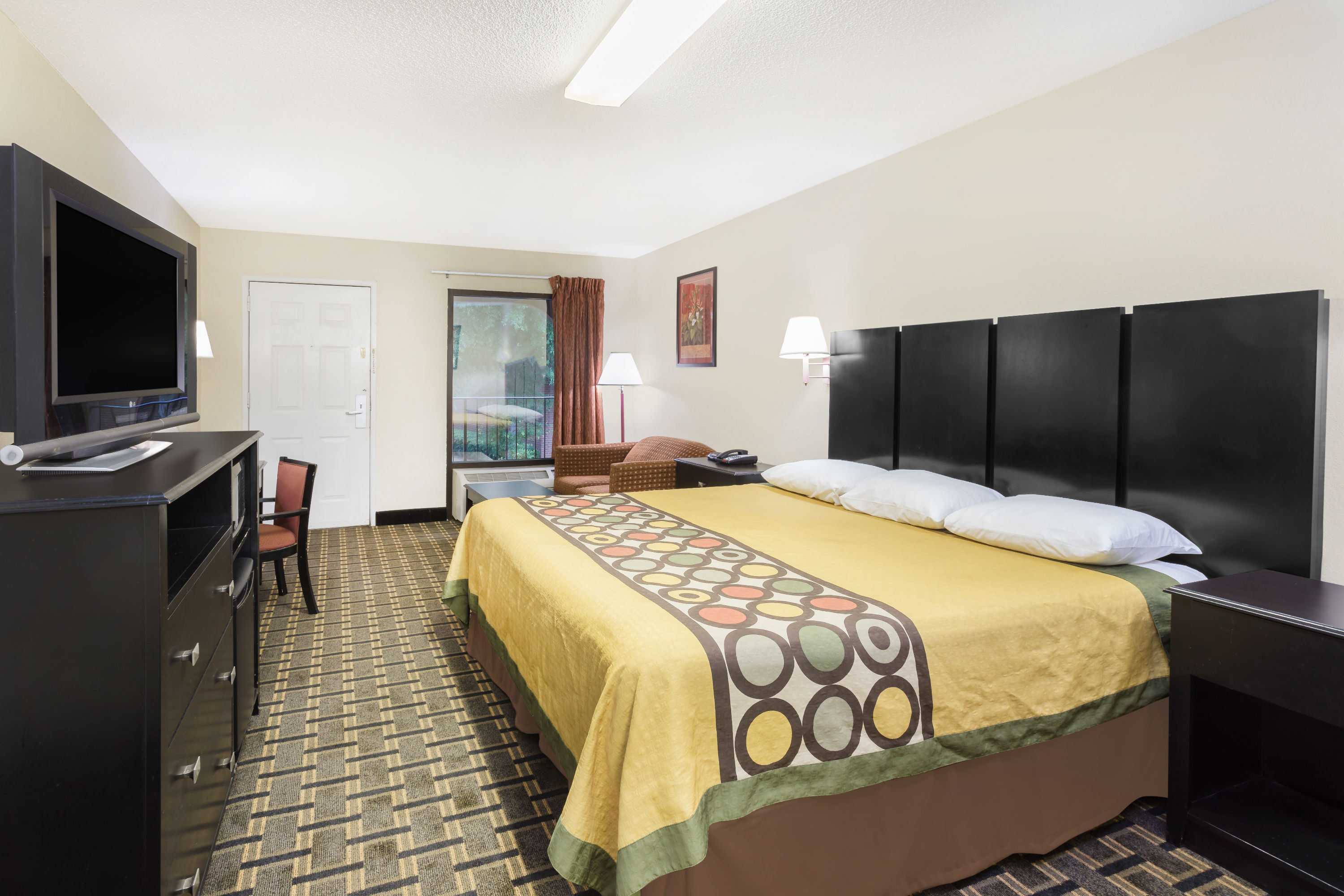 Guest room at the Super 8 by Wyndham Decatur/Lithonia/Atl Area in Decatur, Georgia