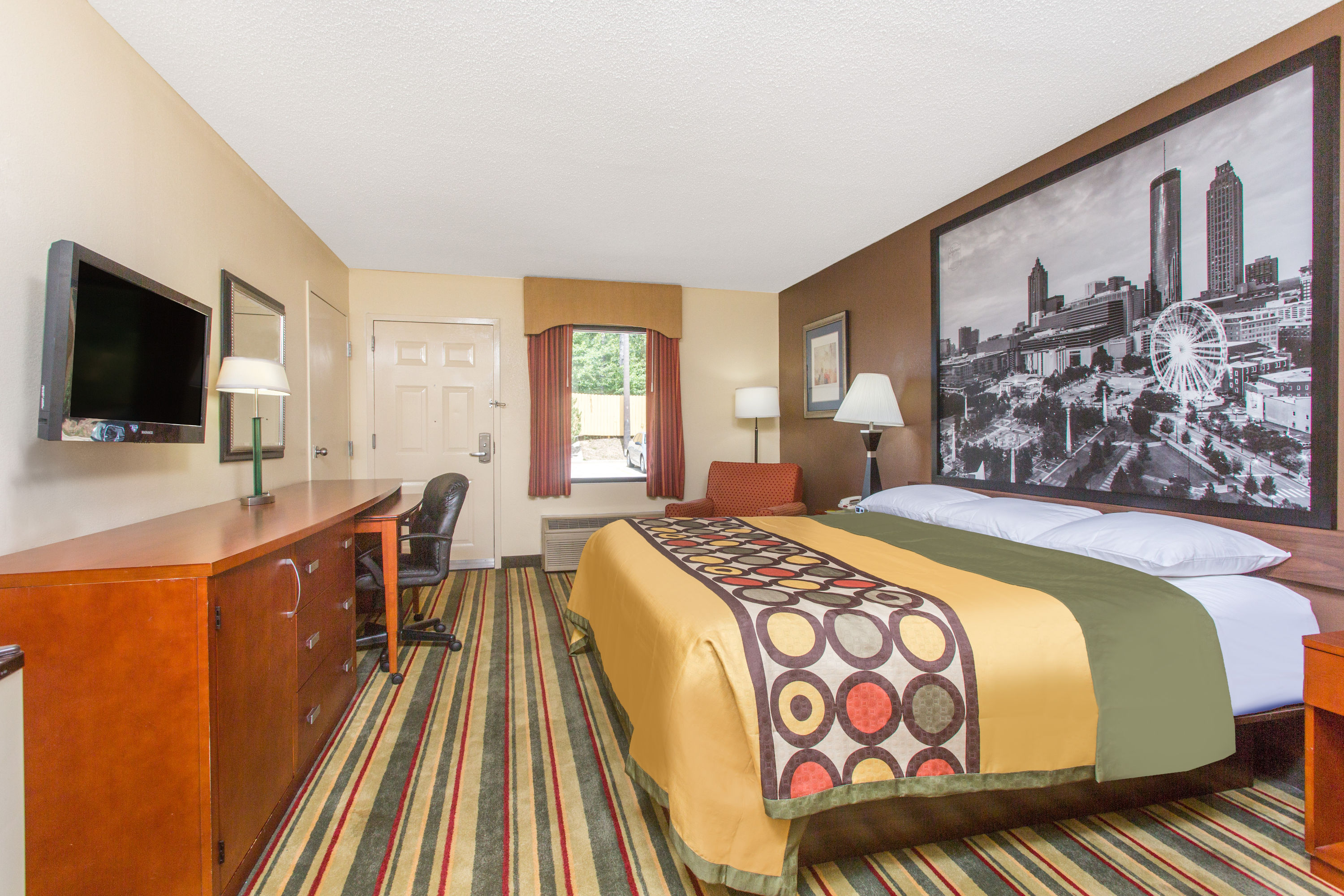 Guest room at the Super 8 by Wyndham Dublin in Dublin, Georgia