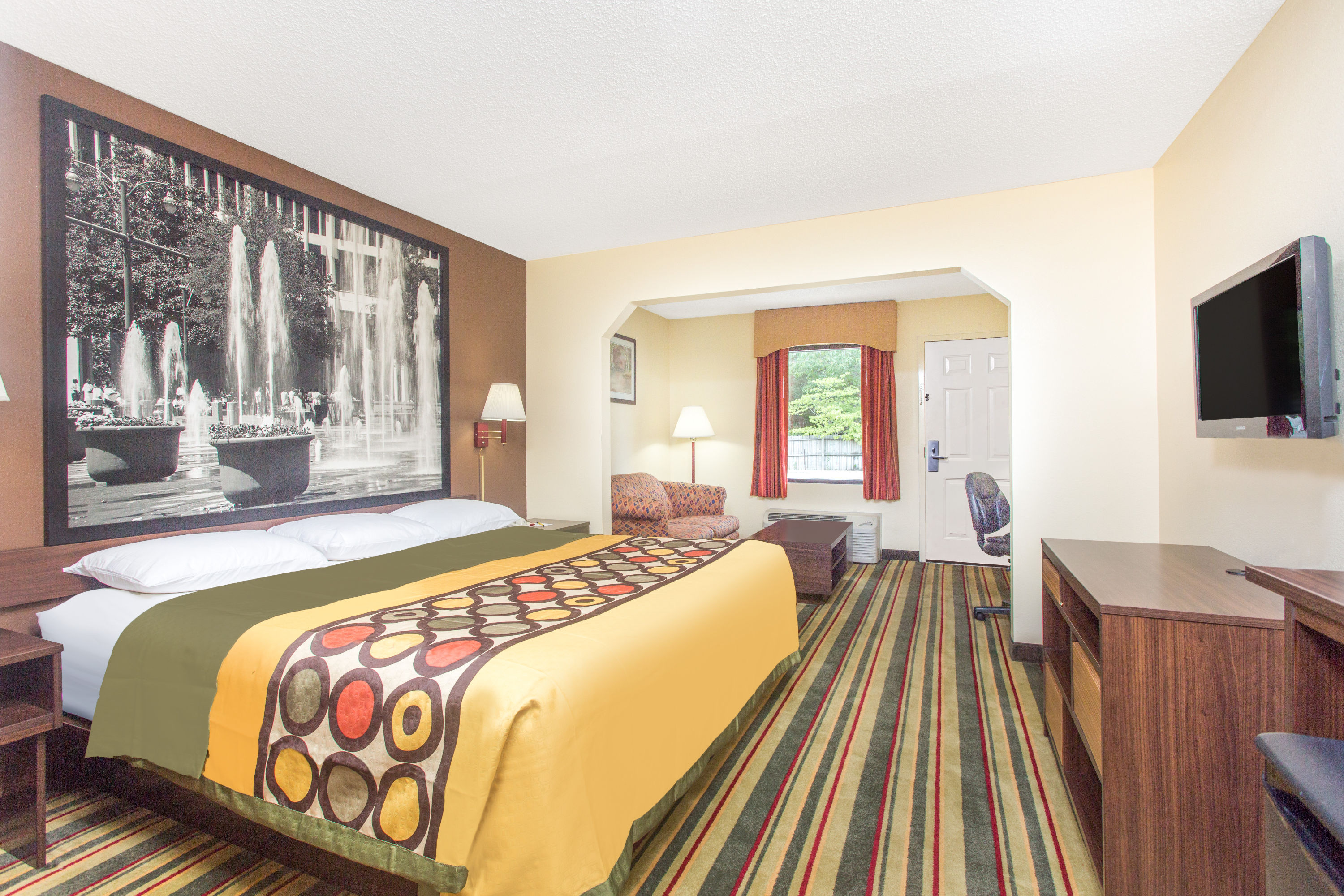 Guest room at the Super 8 by Wyndham Dublin in Dublin, Georgia