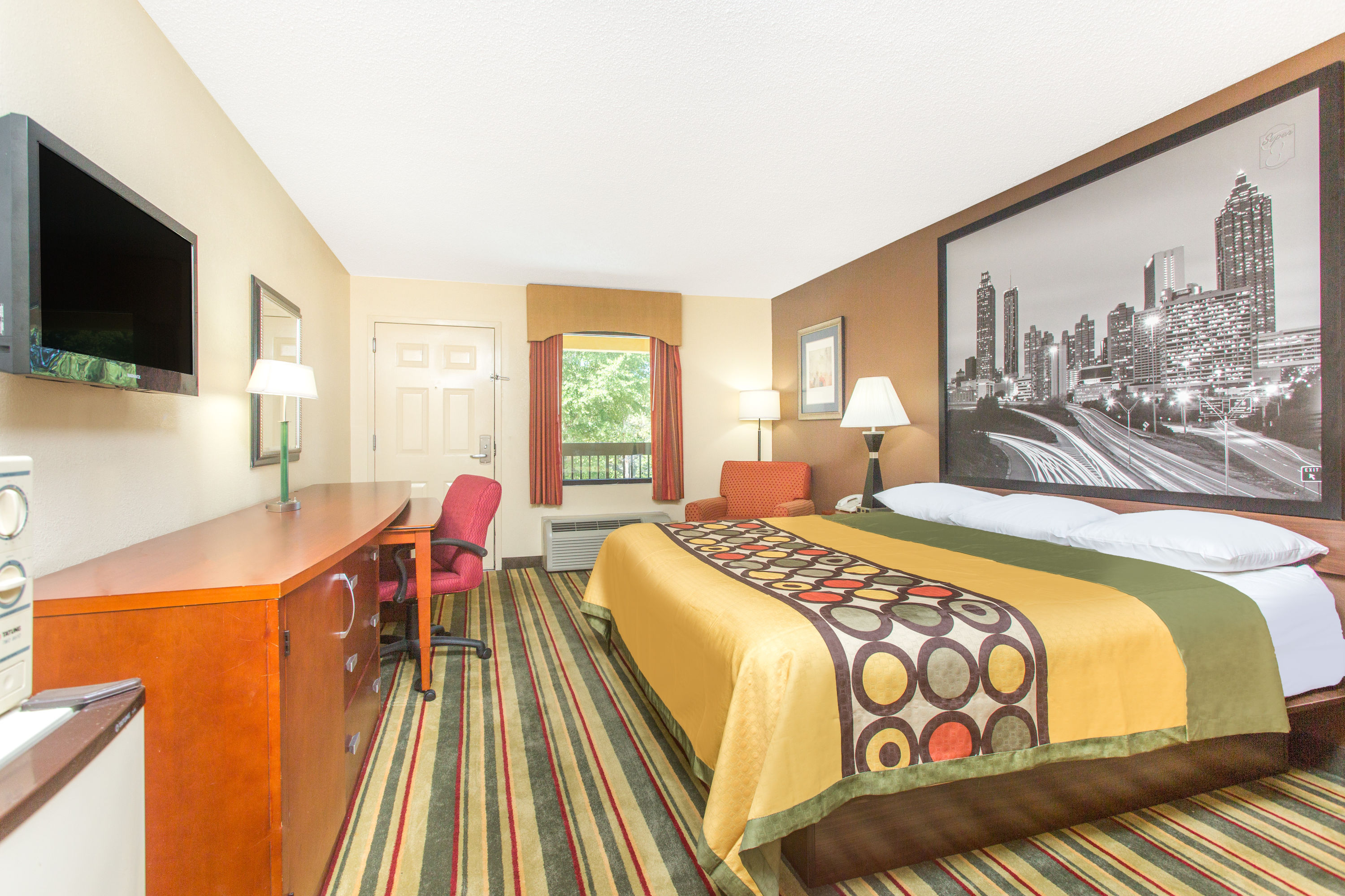 Guest room at the Super 8 by Wyndham Dublin in Dublin, Georgia