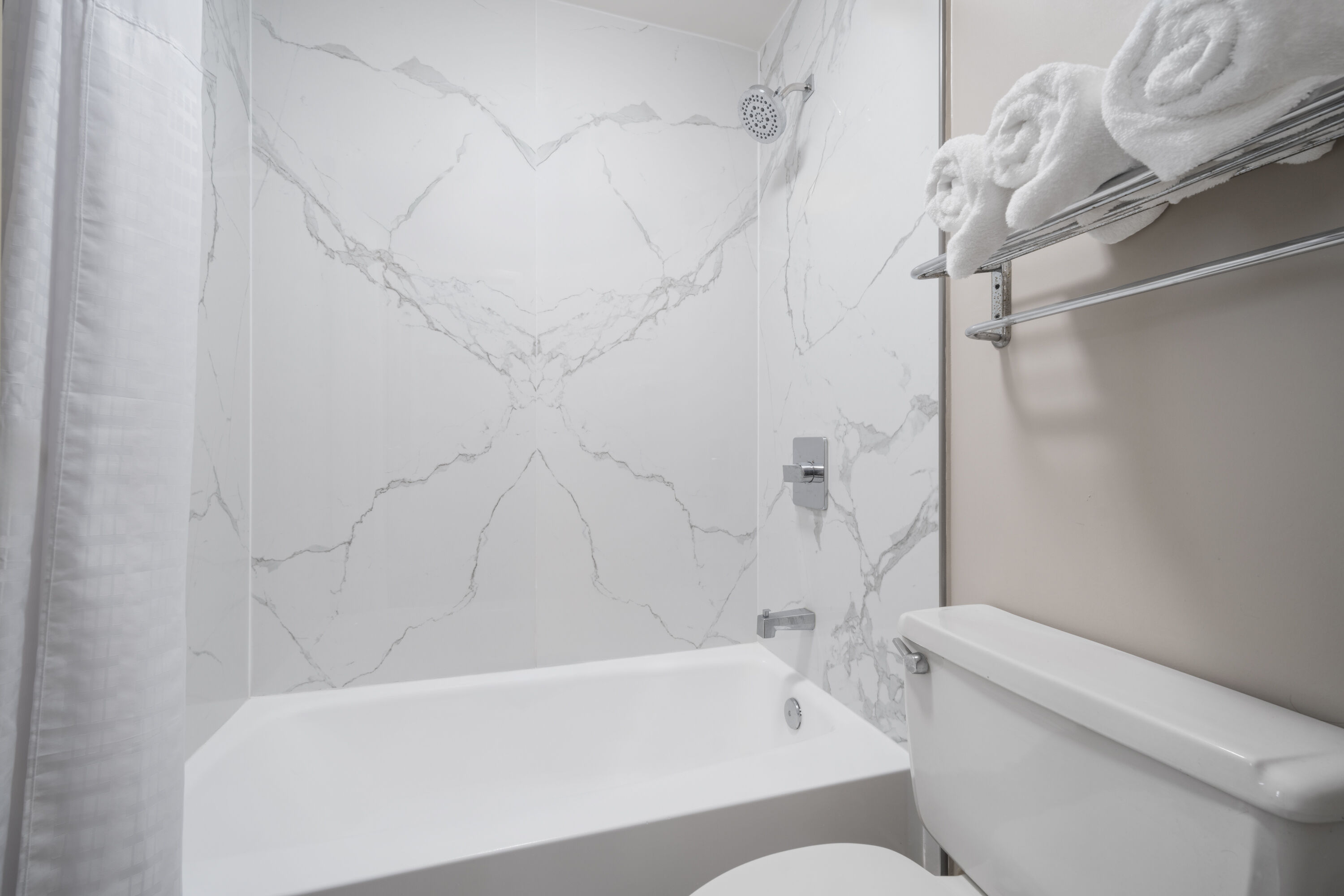 Guest room bath at the Super 8 by Wyndham Macon West in Macon, Georgia