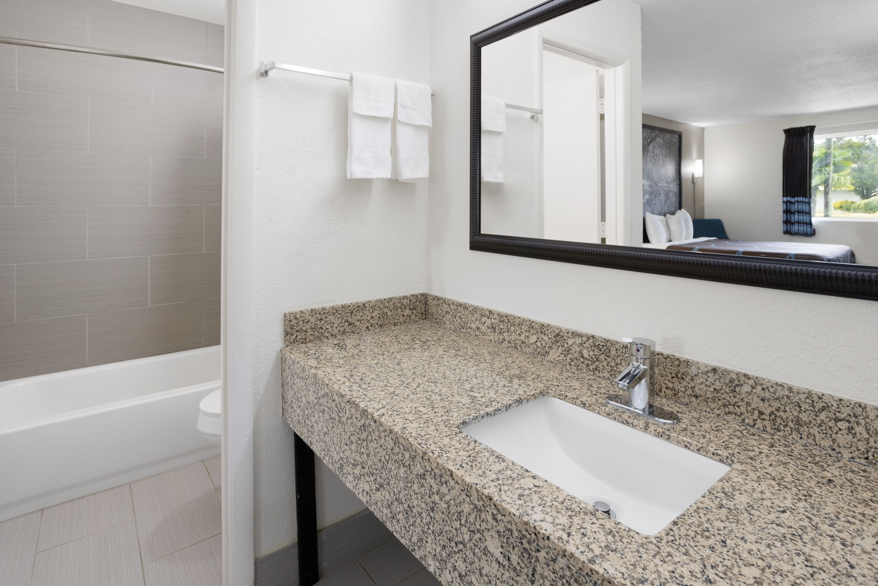 Guest room bath at the Super 8 by Wyndham Perry National Fairground Area I-75 in Perry, Georgia