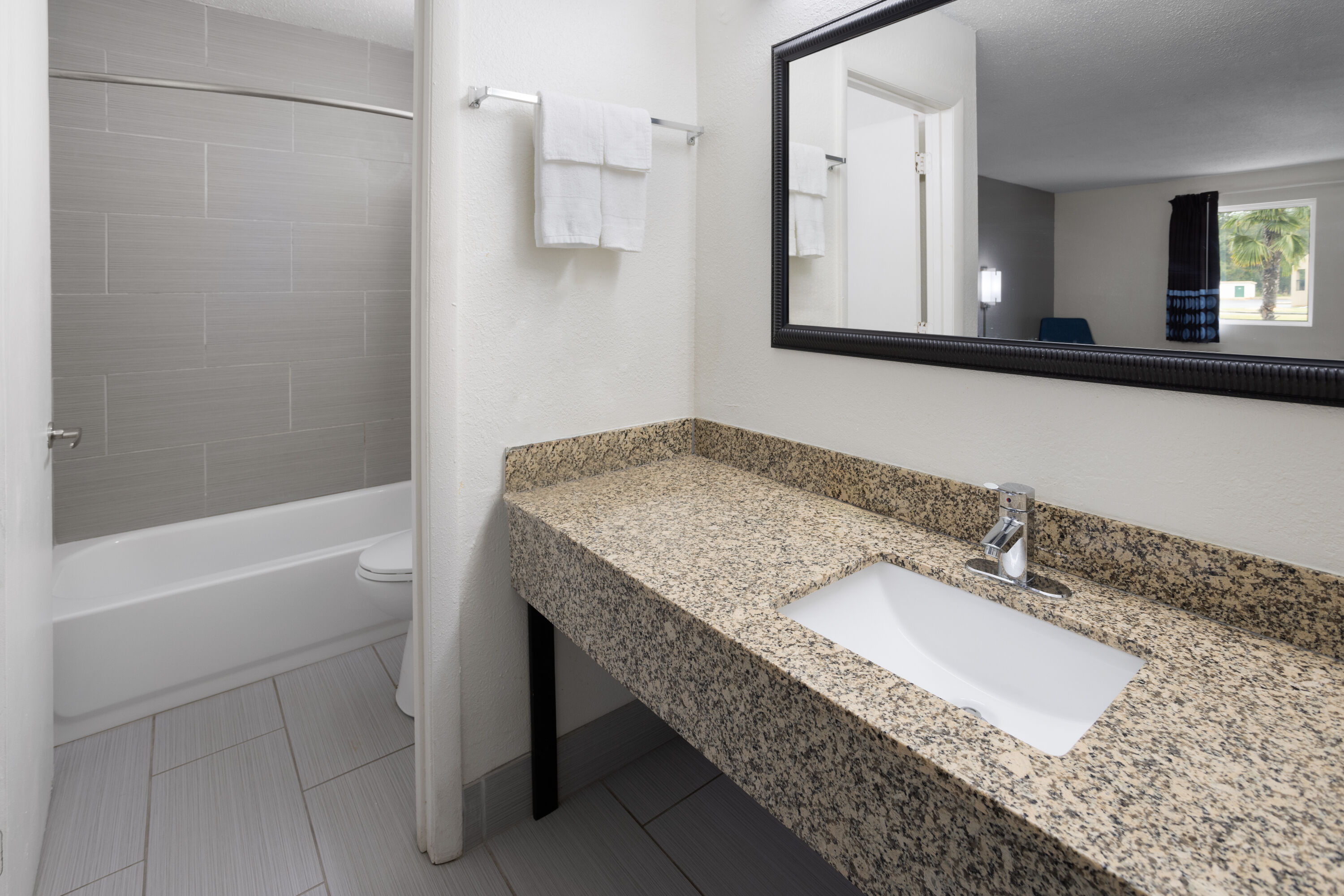 Guest room bath at the Super 8 by Wyndham Perry National Fairground Area I-75 in Perry, Georgia