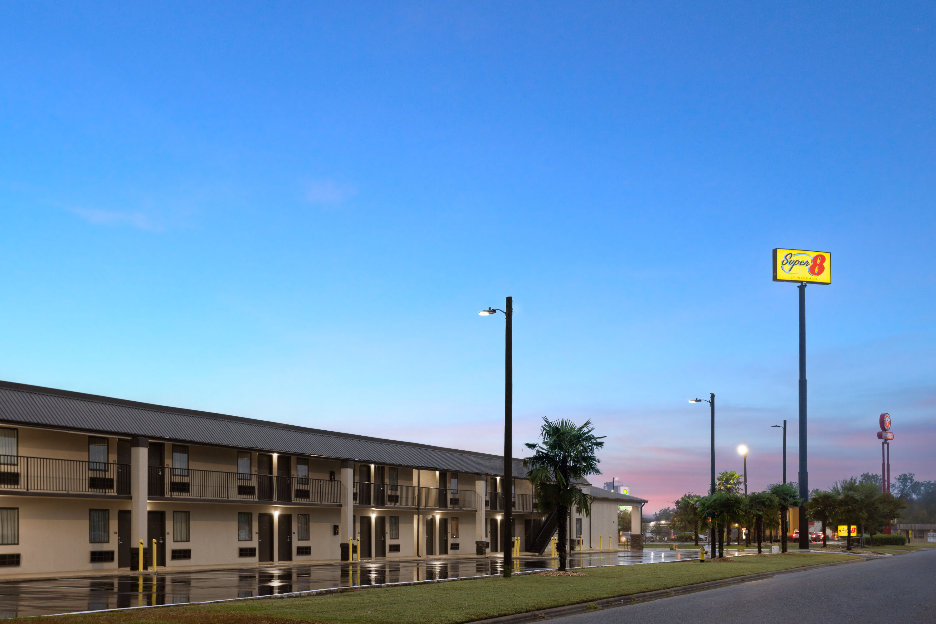 Exterior Dusk Image of Super 8 by Wyndham Perry National Fairground Area I-75 hotel in Perry, Georgia