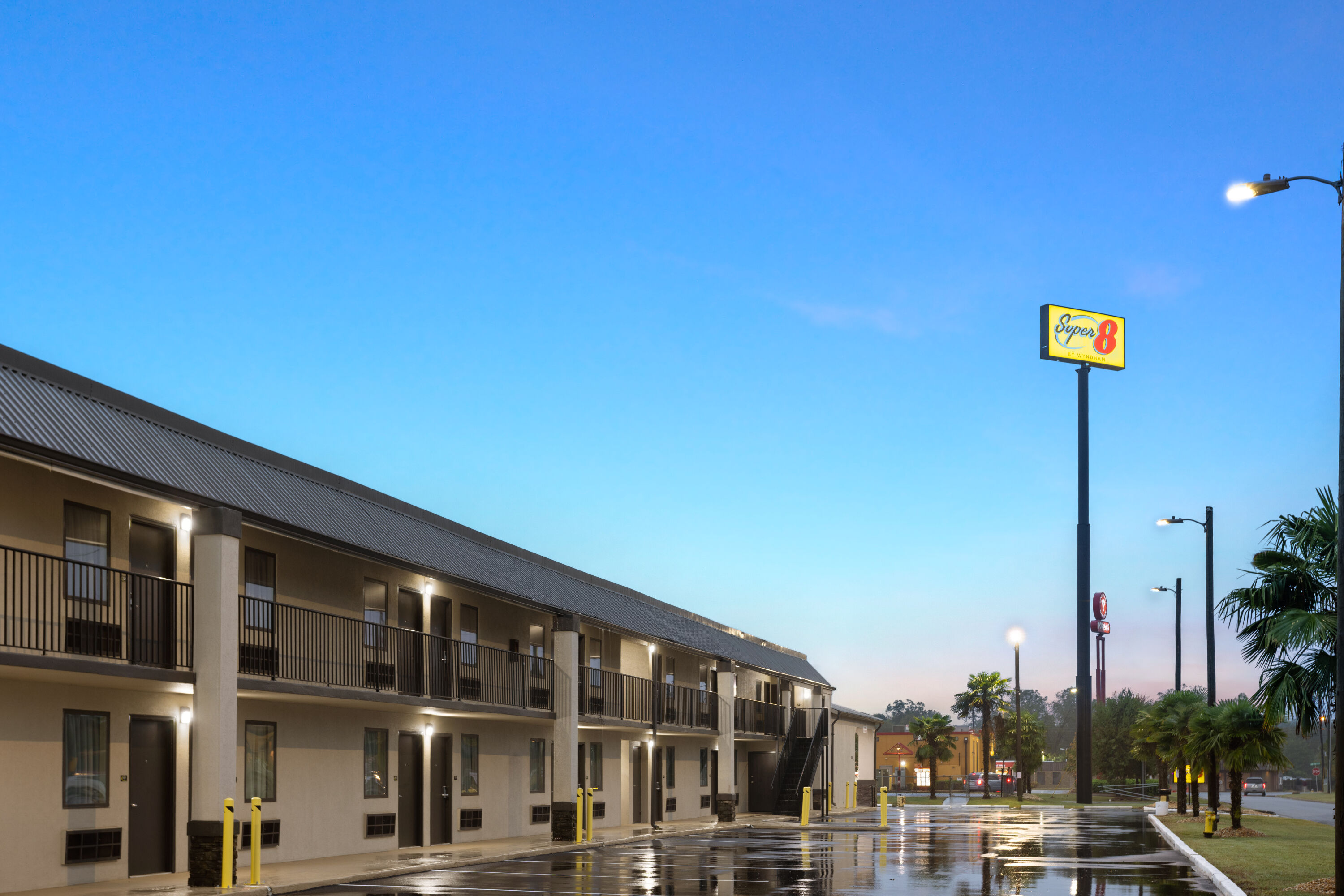 Exterior Dusk Image of Super 8 by Wyndham Perry National Fairground Area I-75 hotel in Perry, Georgia