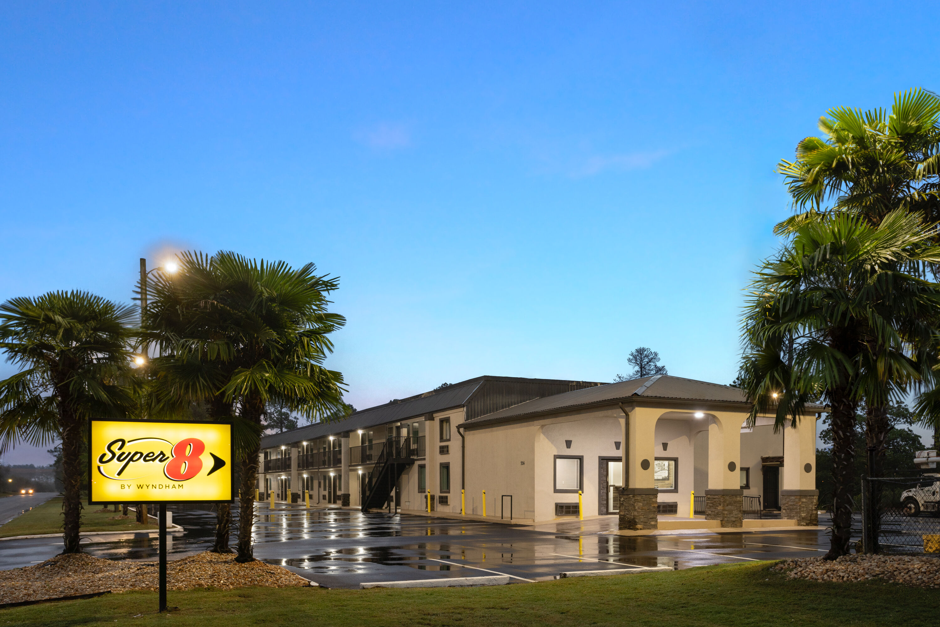 Exterior Dusk Image of Super 8 by Wyndham Perry National Fairground Area I-75 hotel in Perry, Georgia