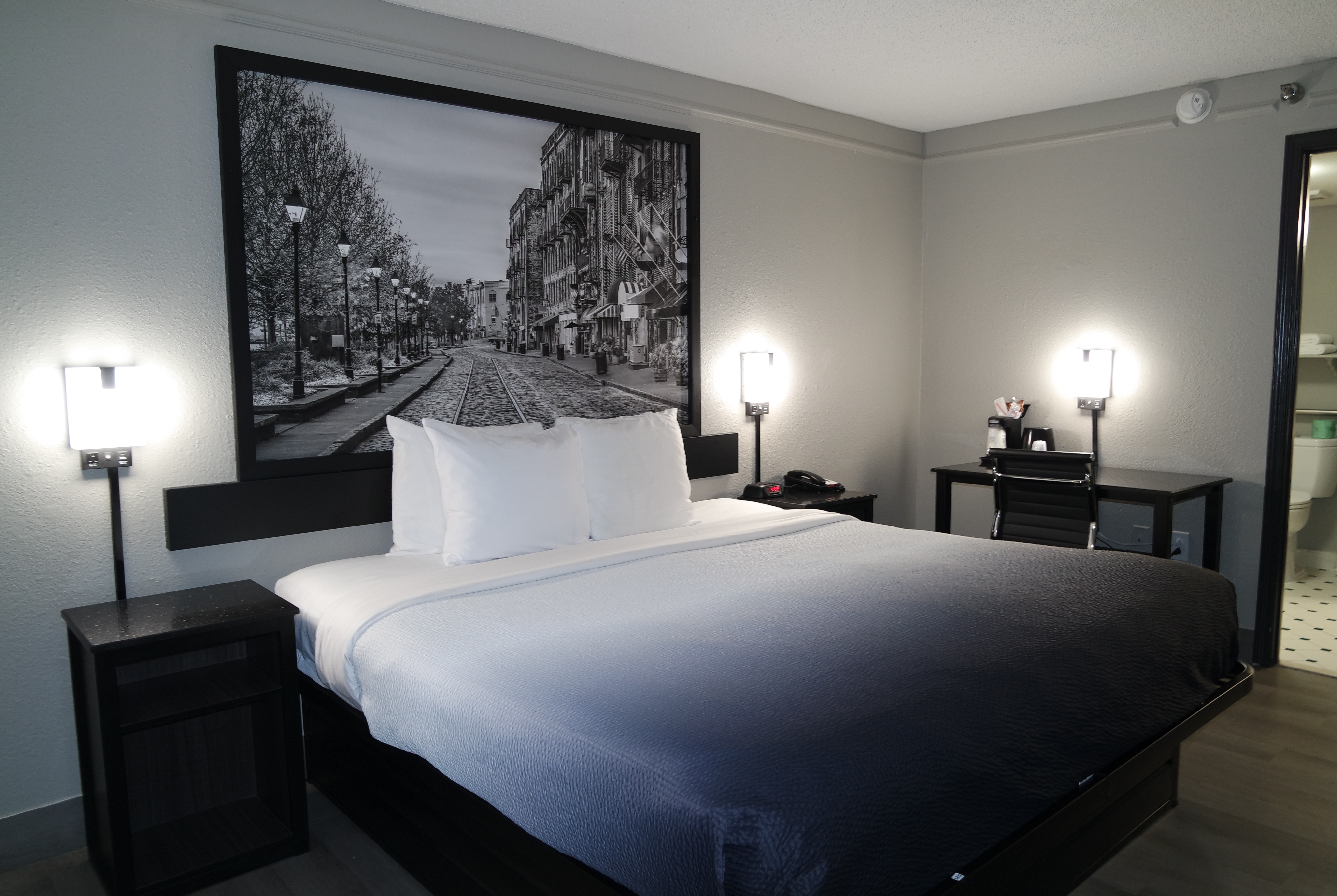 King bed guest room at the Super 8 by Wyndham Savannah in Savannah, Georgia