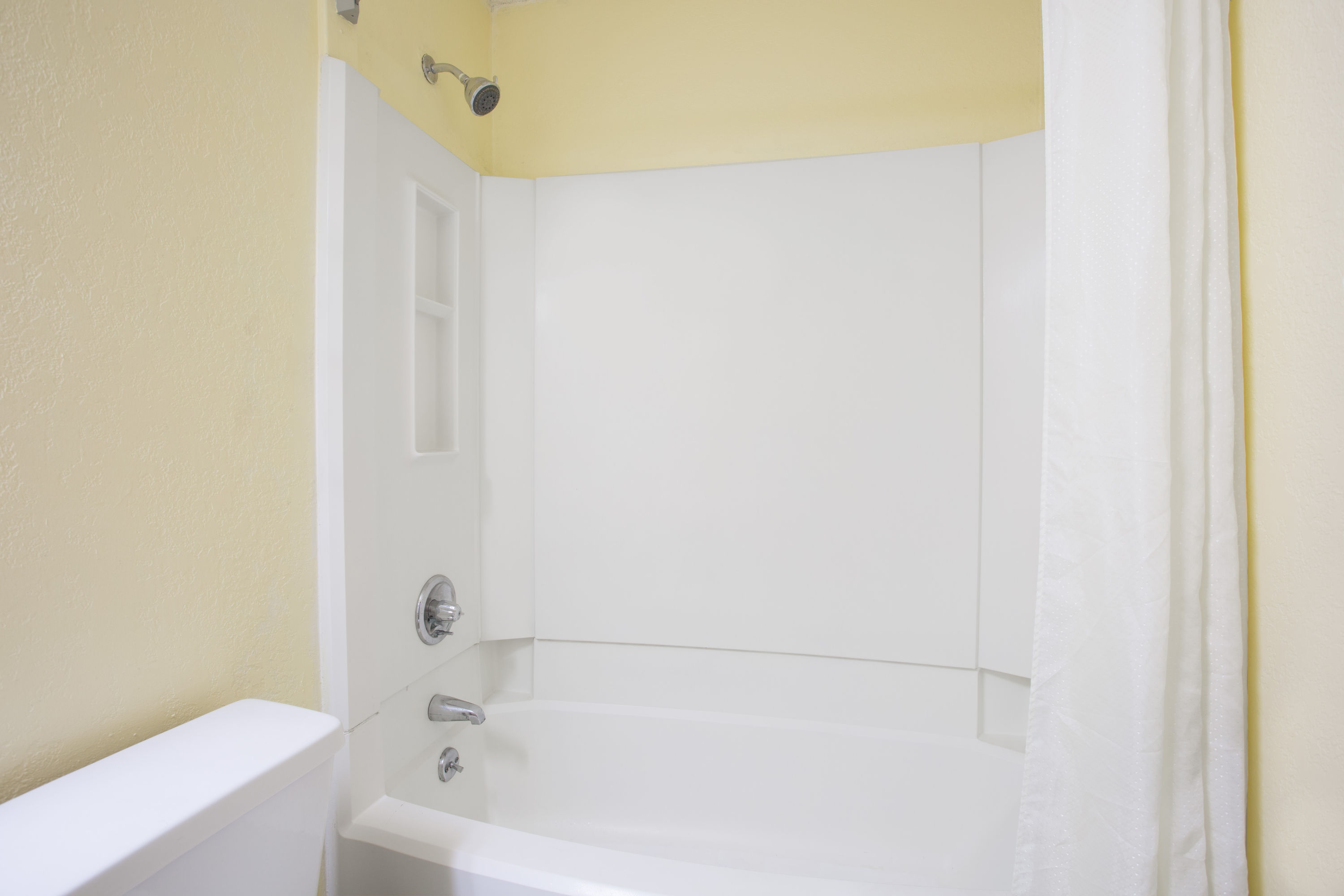 Guest room bath at the Super 8 by Wyndham Warner Robins in Warner Robins, Georgia