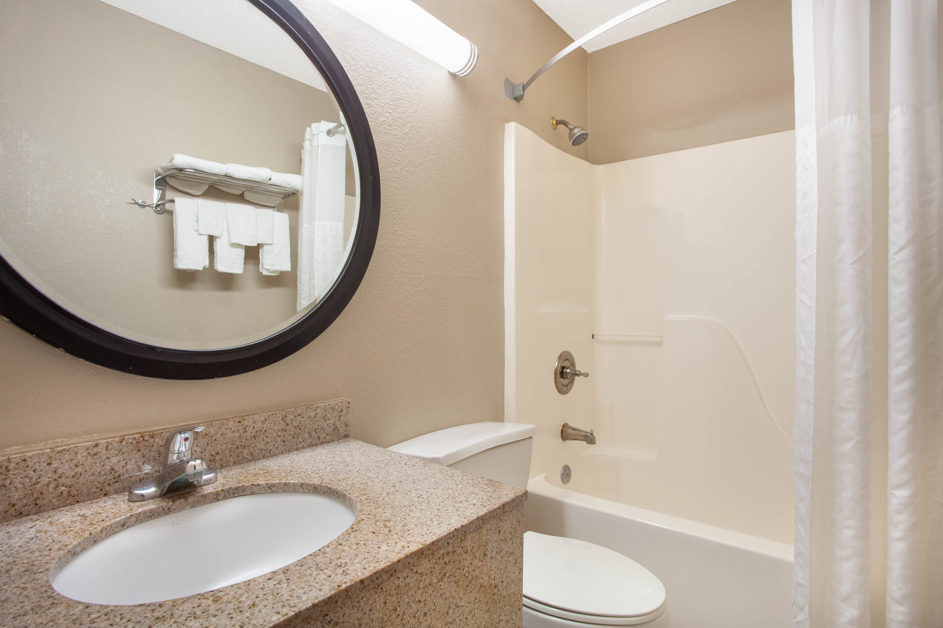 Guest room bath at the Super 8 by Wyndham Waycross GA in Waycross, Georgia