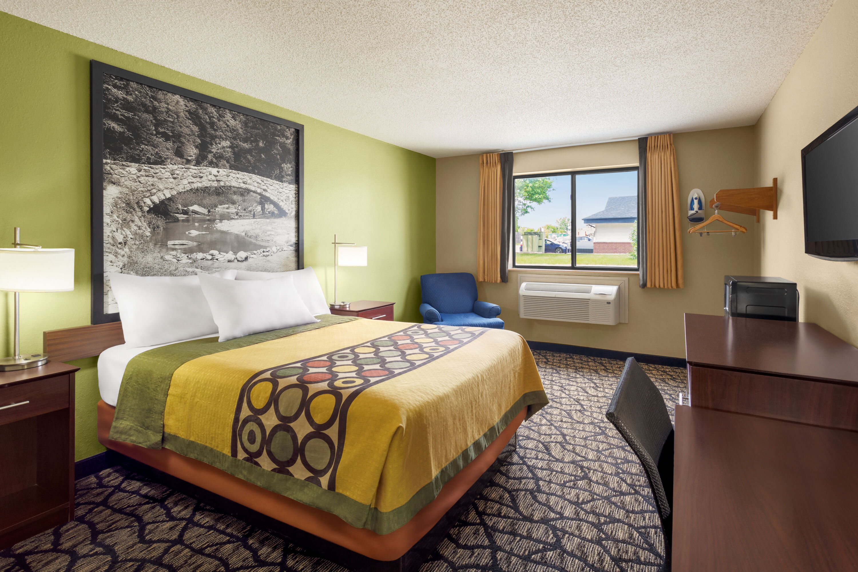 Guest room at the Super 8 by Wyndham Ankeny/Des Moines Area in Ankeny, Iowa