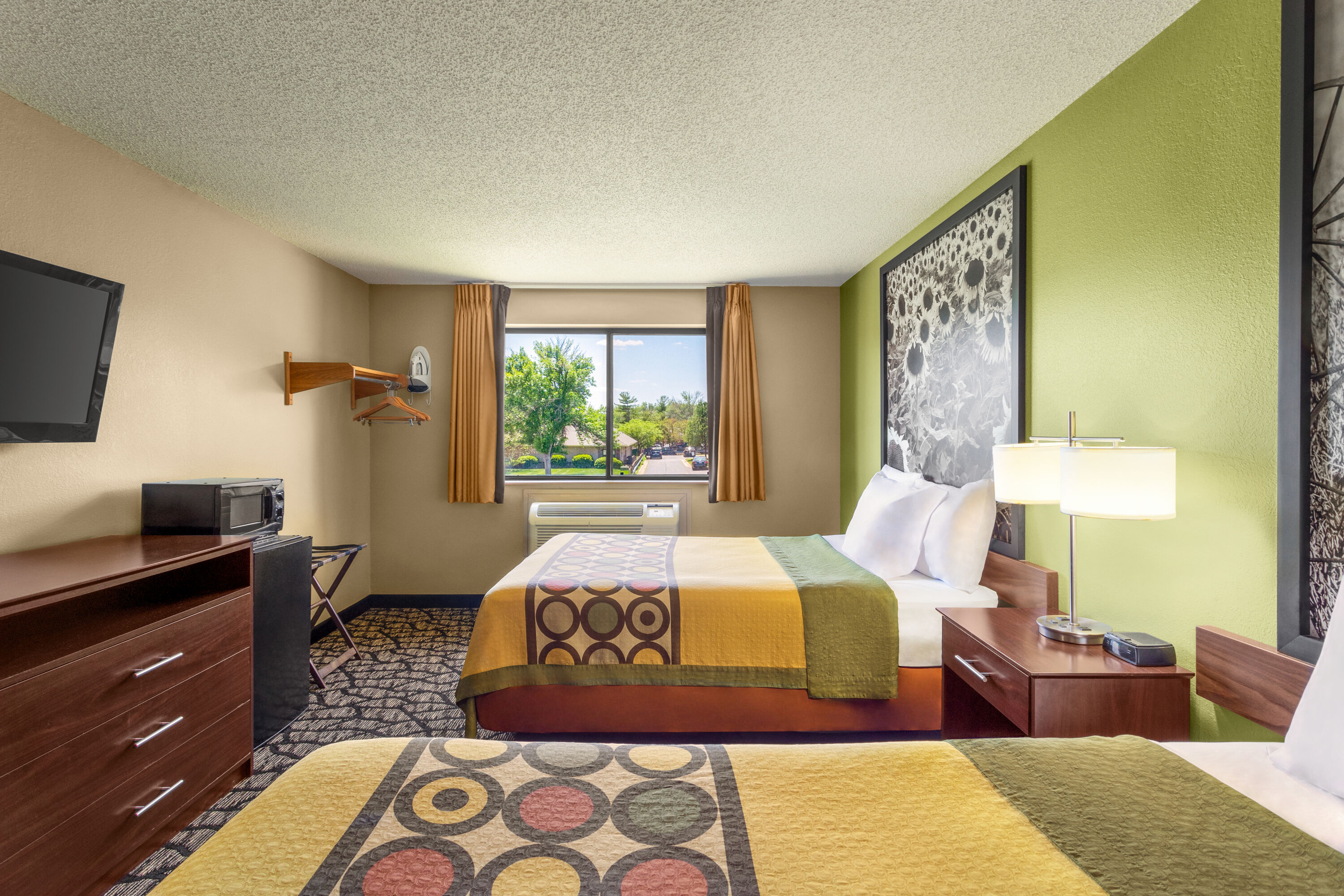 Guest room at the Super 8 by Wyndham Ankeny/Des Moines Area in Ankeny, Iowa