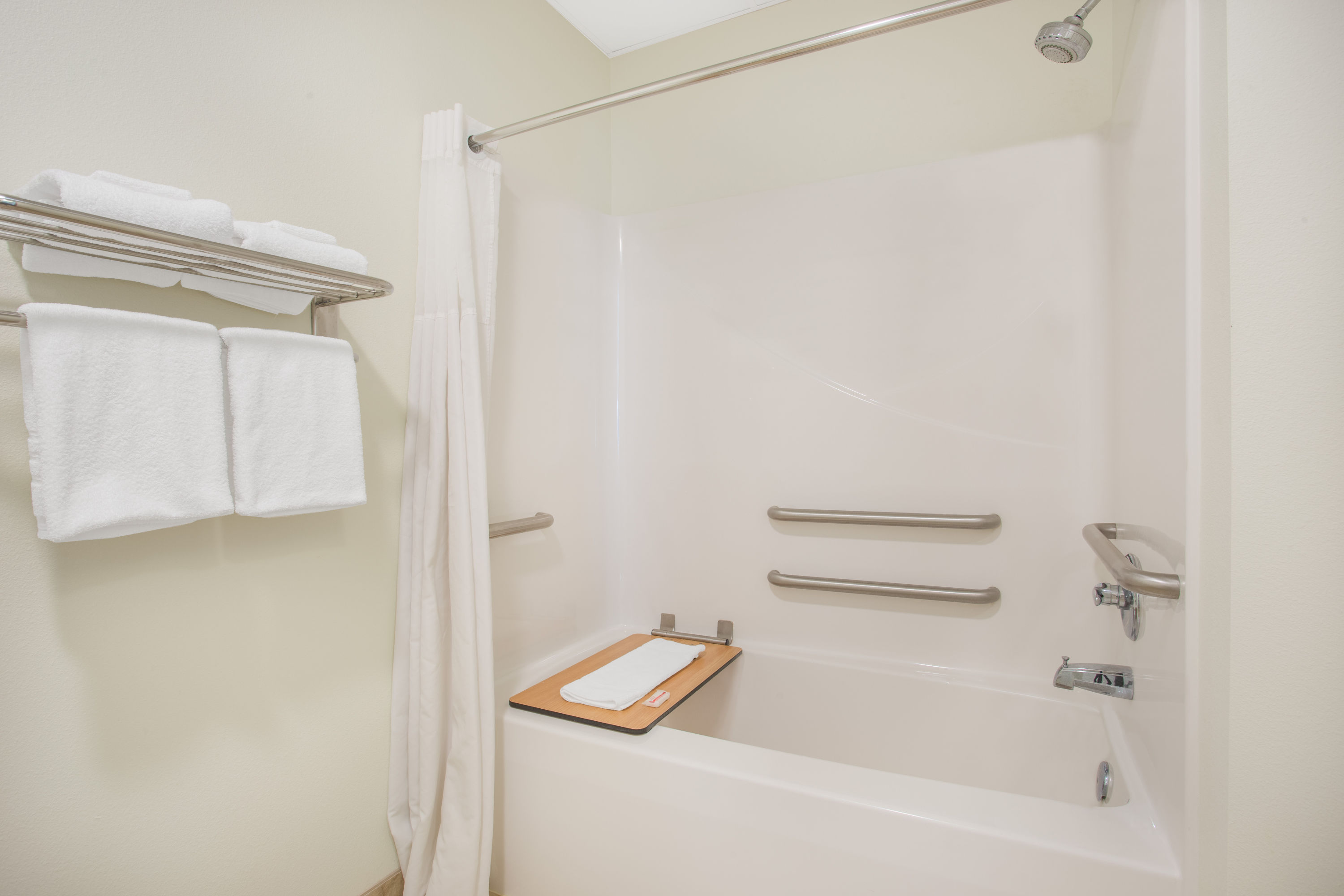 Guest room bath at the Super 8 by Wyndham Cedar Falls IA - University in Cedar Falls, Iowa