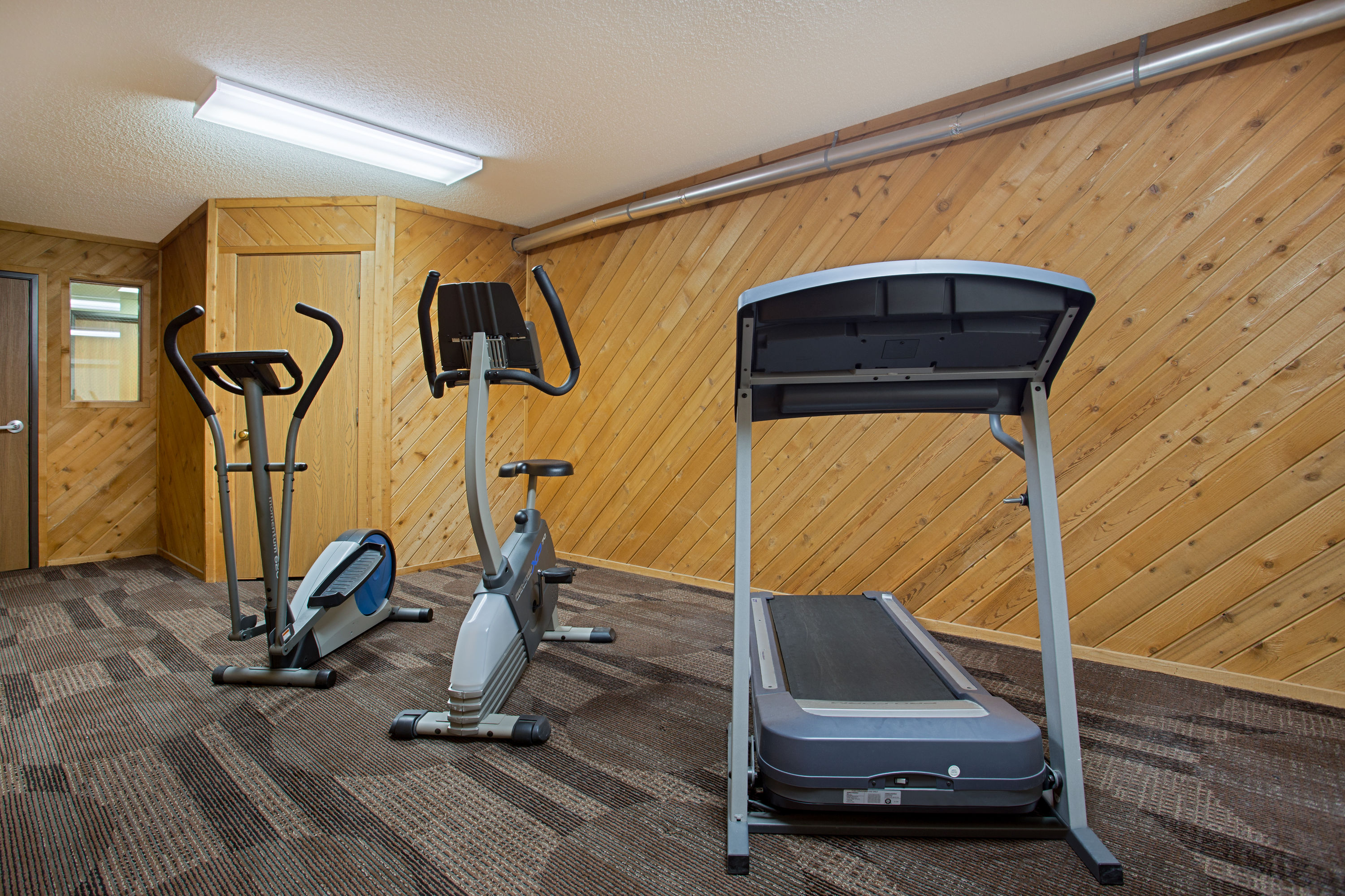 Fitness room at Super 8 by Wyndham Charles City in Charles City, Iowa
