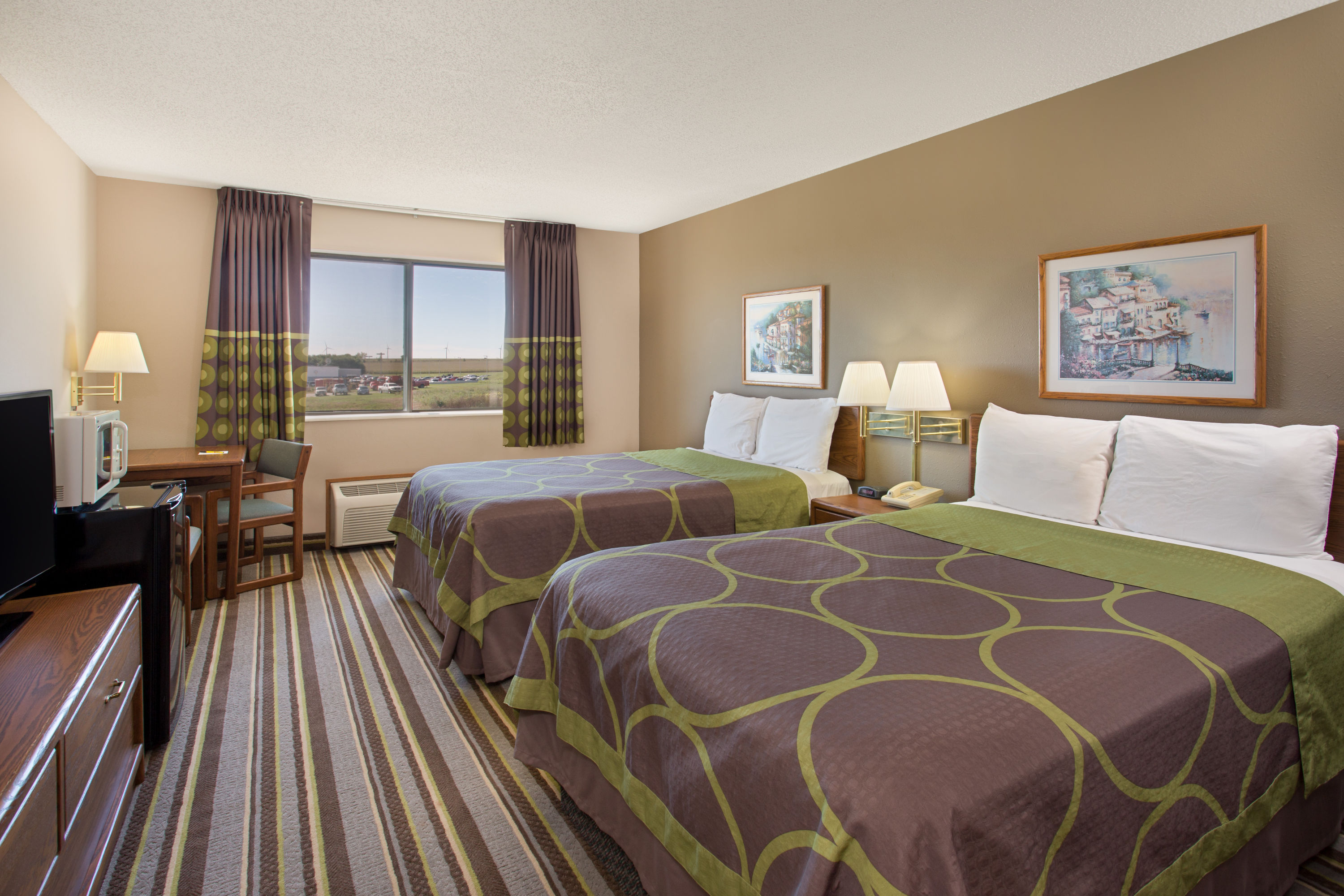 Guest room at the Super 8 by Wyndham Charles City in Charles City, Iowa