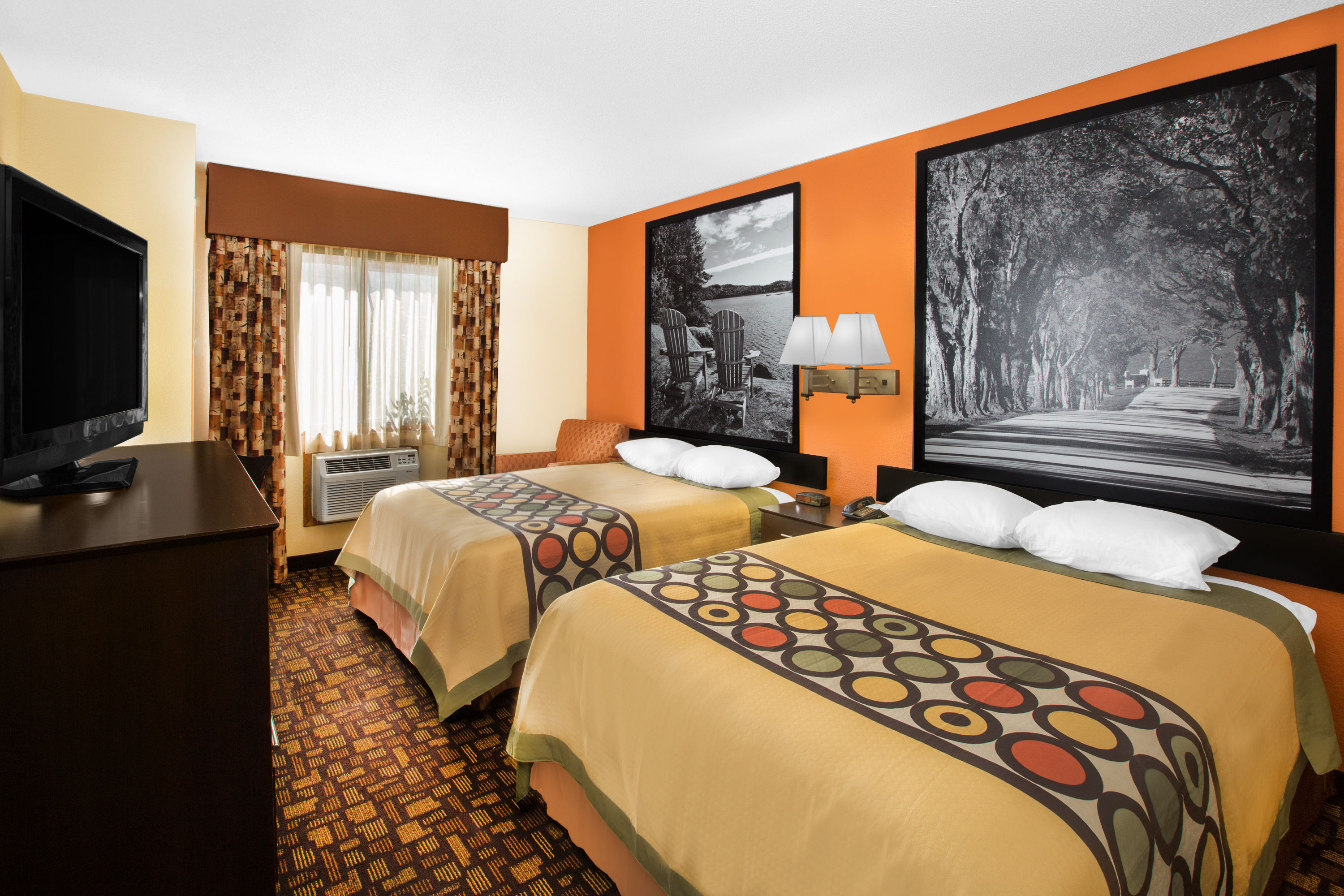 Guest room at the Super 8 by Wyndham Clive IA in Clive, Iowa