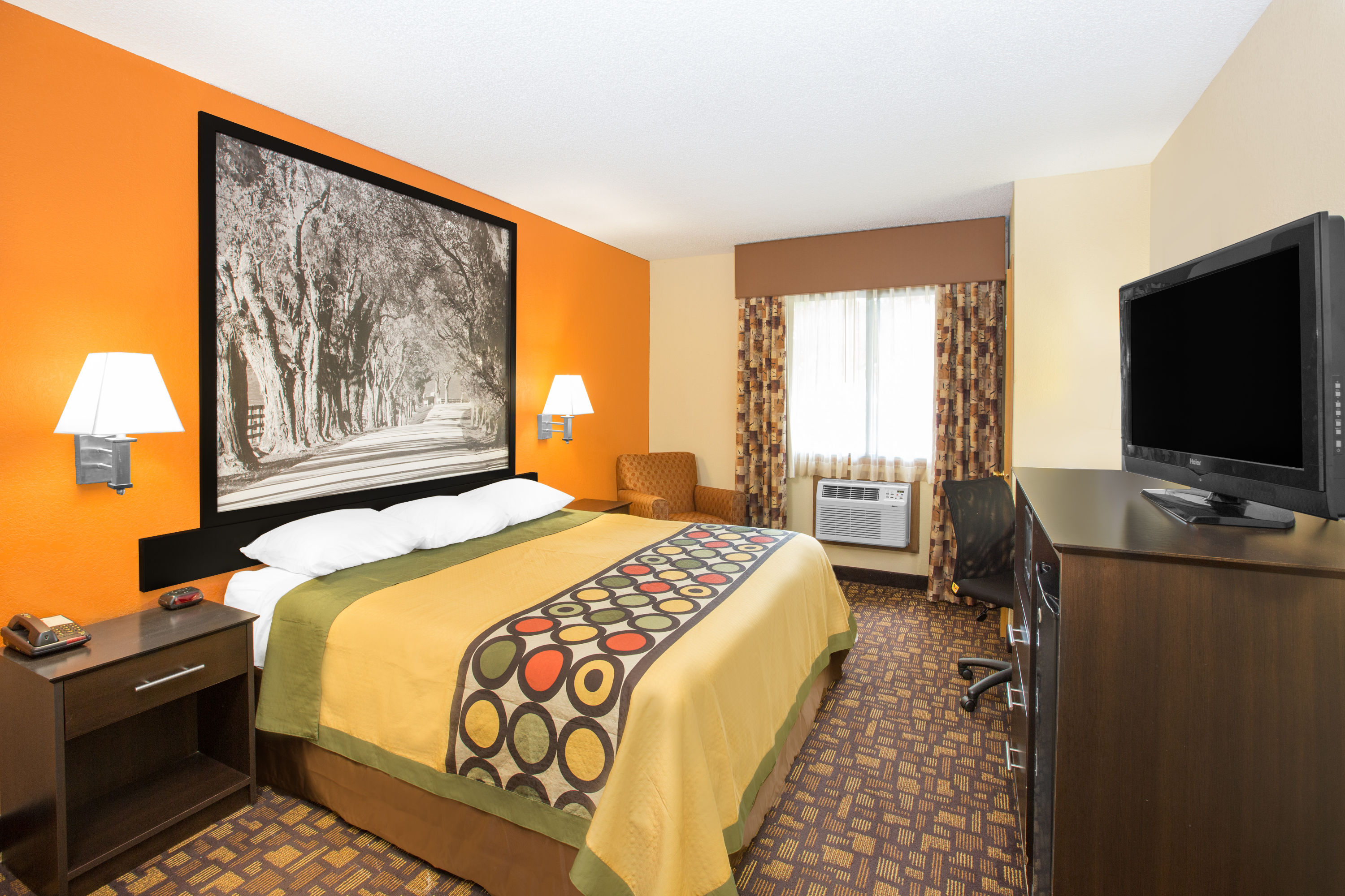 Guest room at the Super 8 by Wyndham Clive IA in Clive, Iowa