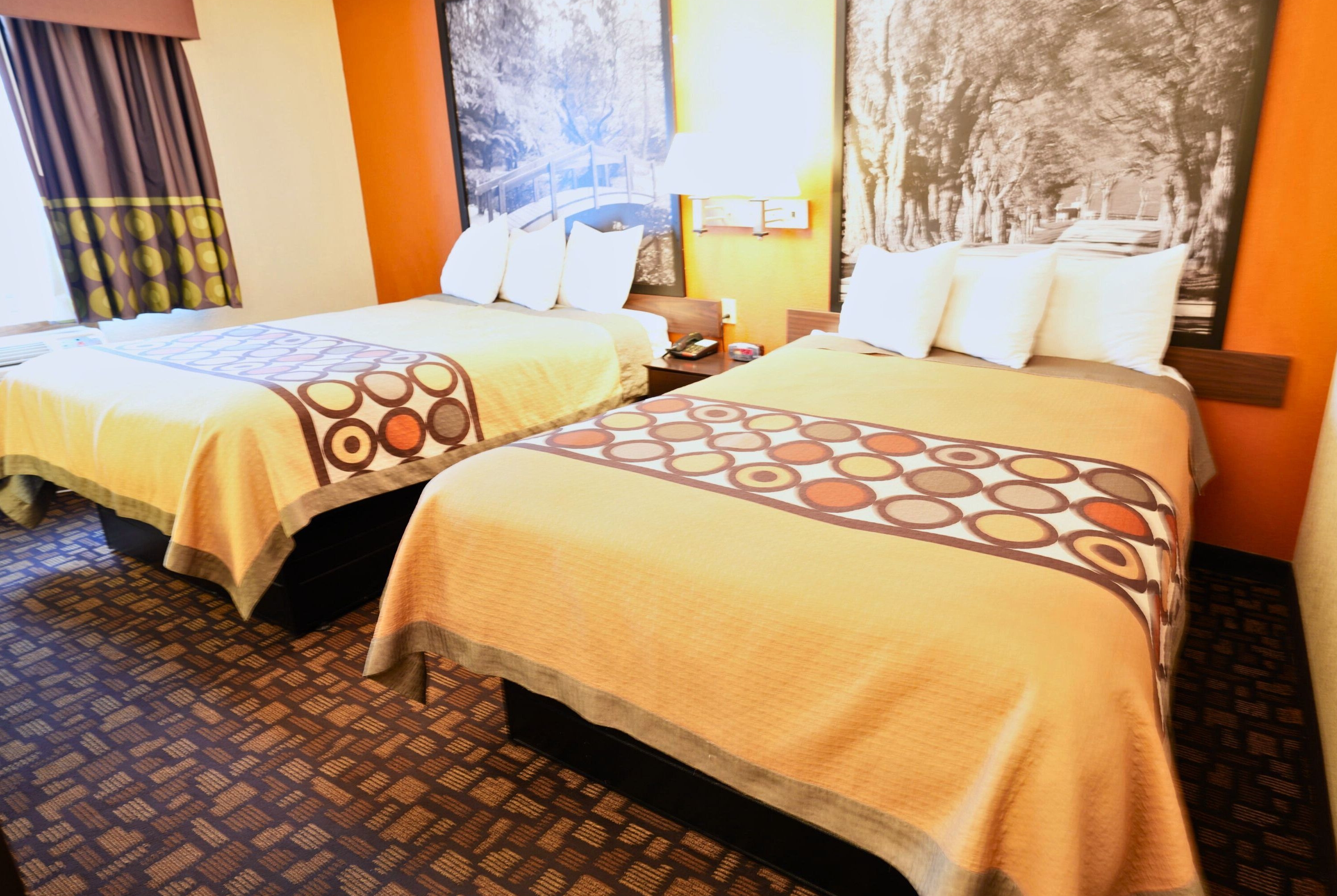 Guest room at the Super 8 by Wyndham Clive IA in Clive, Iowa