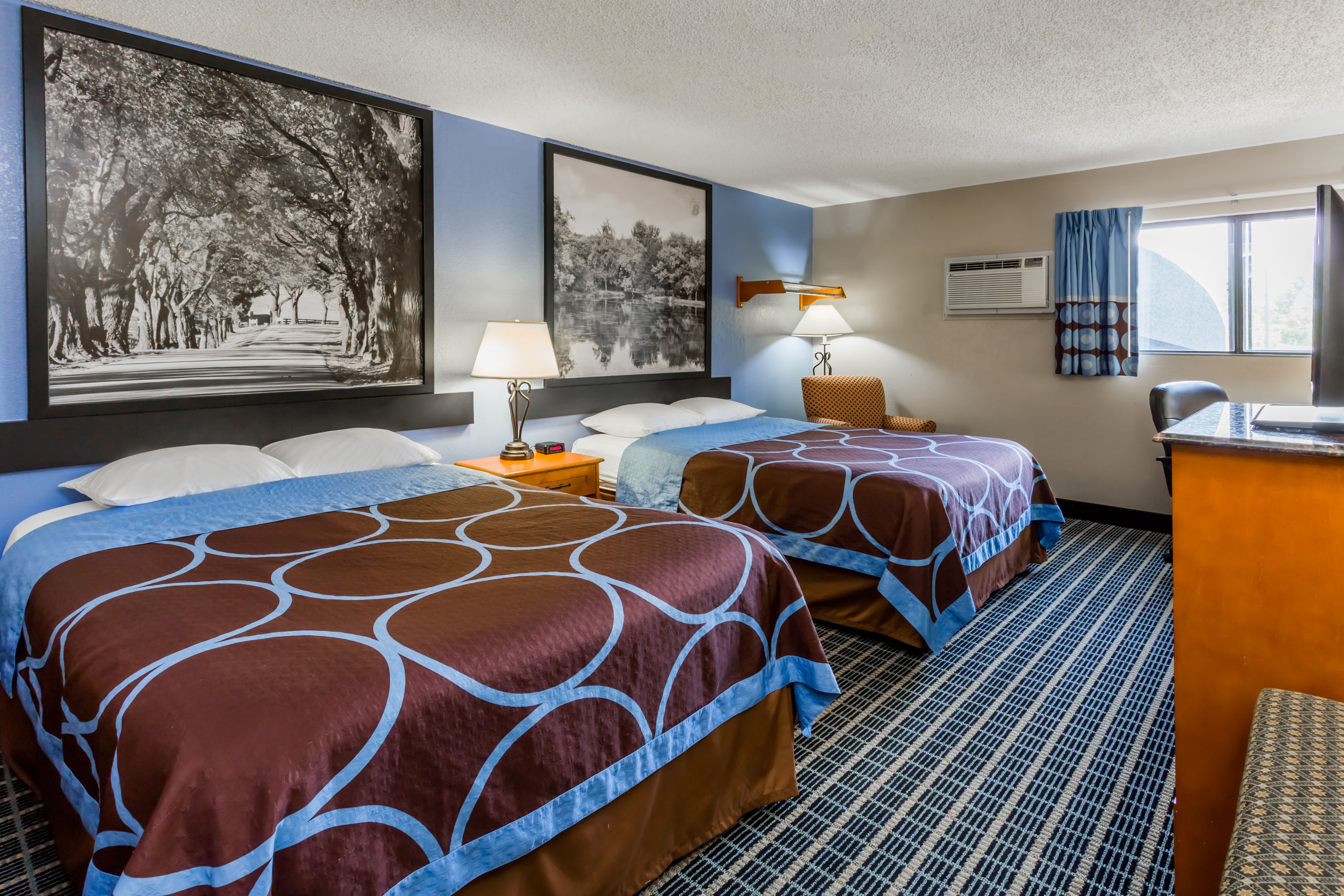 Guest room at the Super 8 by Wyndham Iowa City/Coralville in Coralville, Iowa