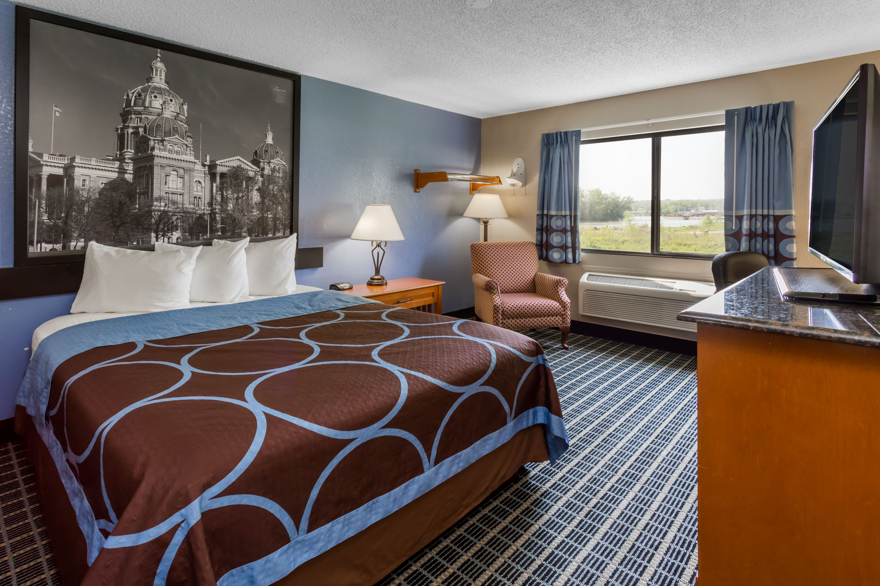 Guest room at the Super 8 by Wyndham Iowa City/Coralville in Coralville, Iowa