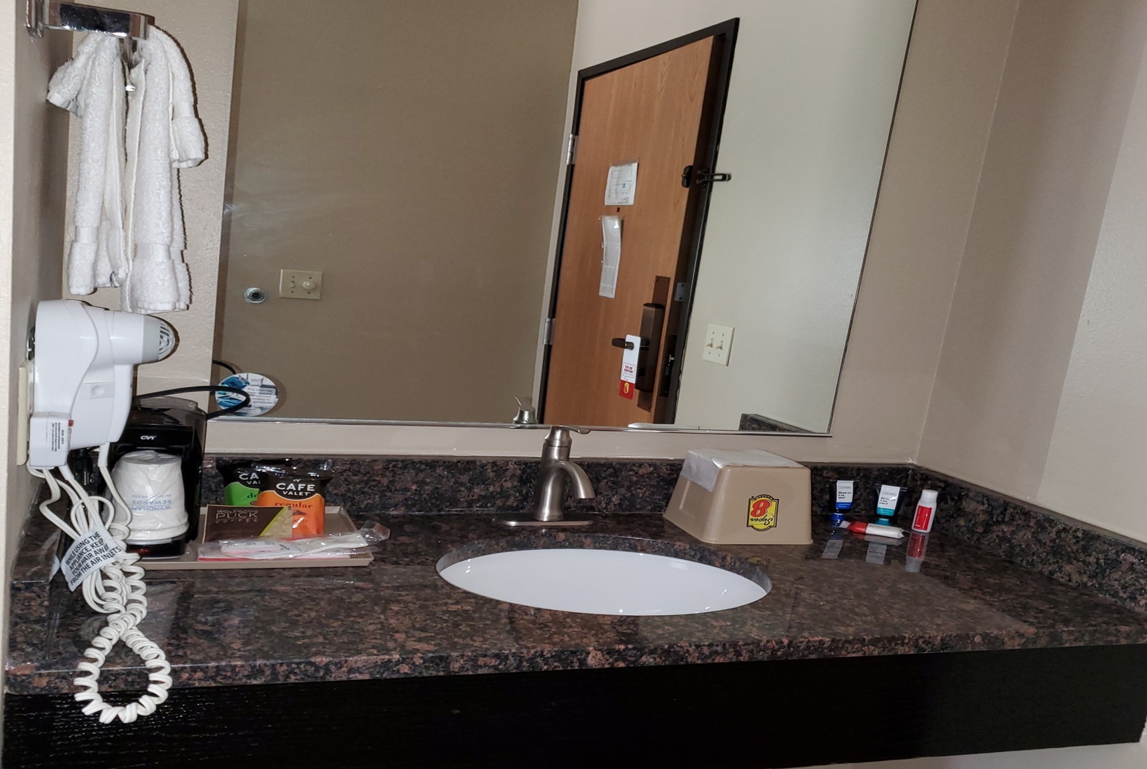 Guest room bath at the Super 8 by Wyndham Estherville in Estherville, Iowa