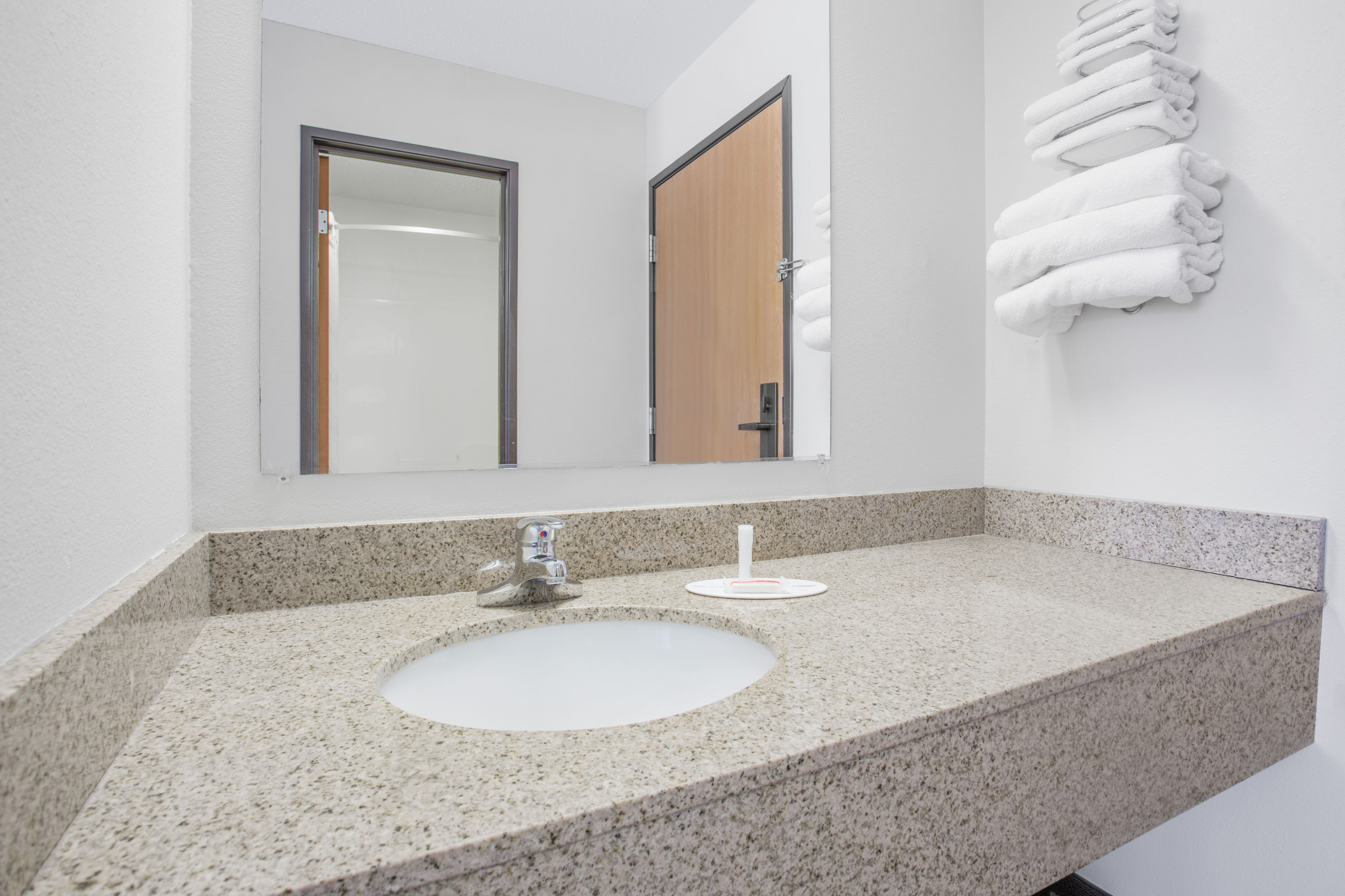 Guest room bath at the Super 8 by Wyndham Independence IA in Independence, Iowa