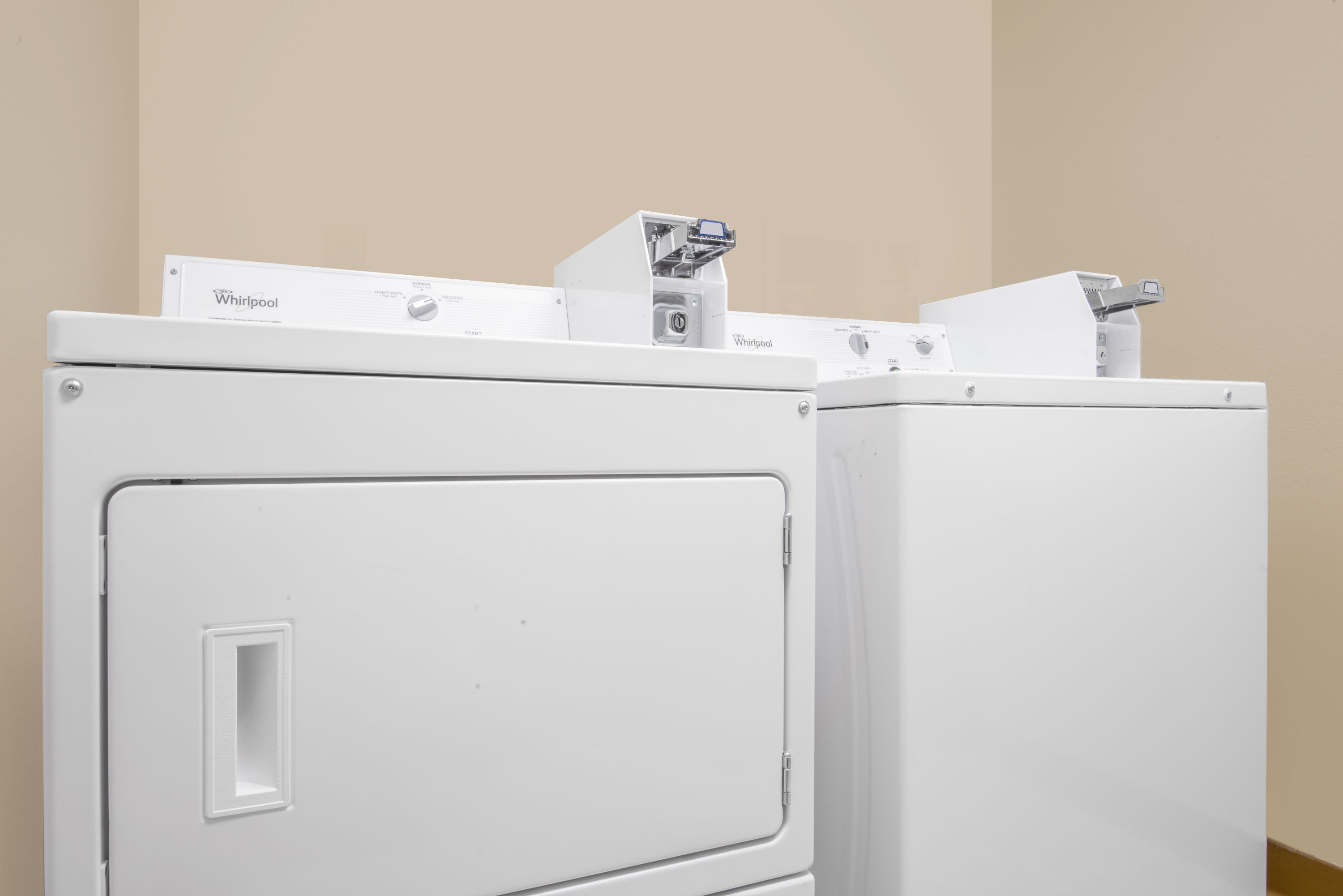 Laundry facilities at Super 8 by Wyndham Knoxville in Knoxville, Iowa