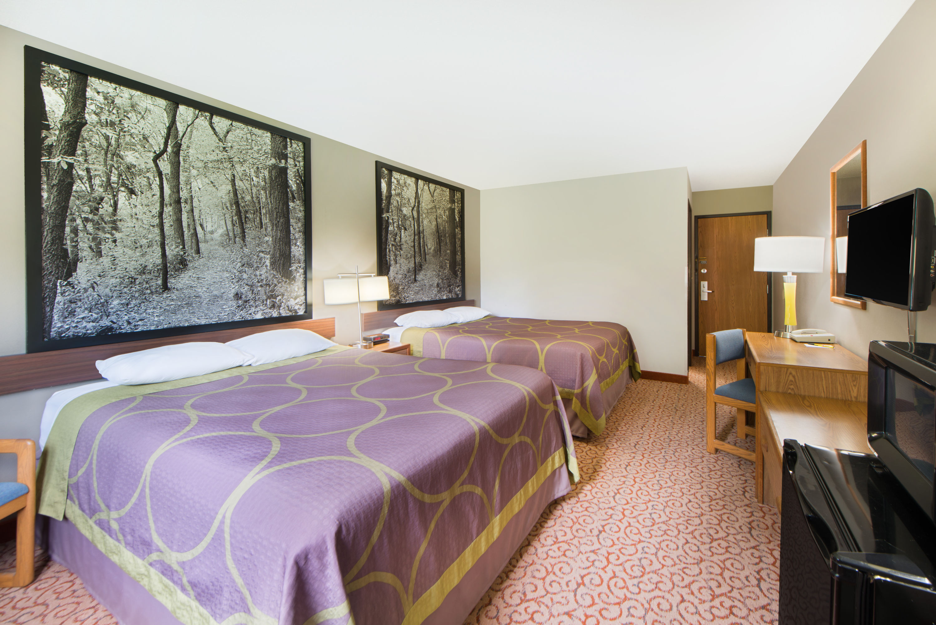 Guest room at the Super 8 by Wyndham Pella in Pella, Iowa