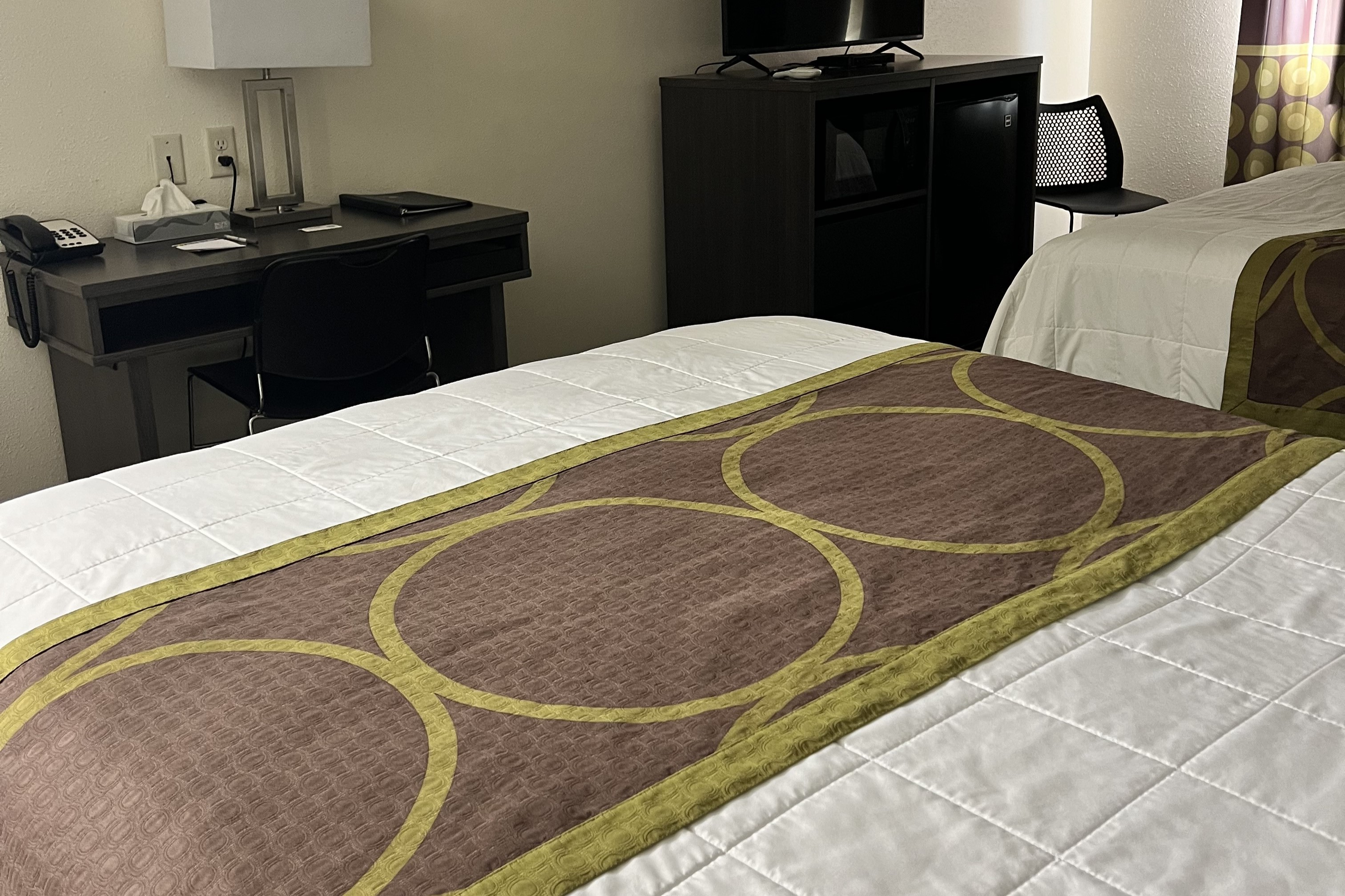 Guest room at the Super 8 by Wyndham Nebraska City in Percival, Iowa