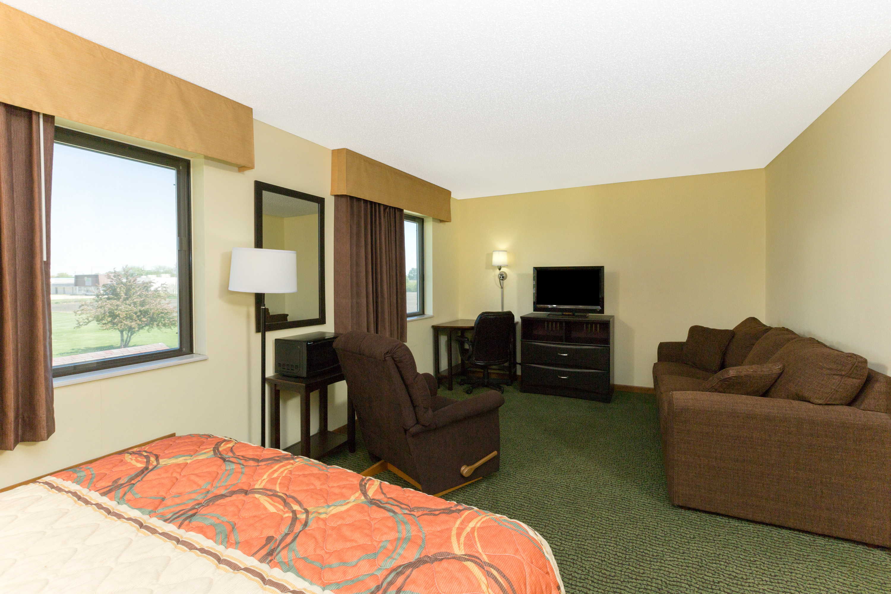 Guest room at the Super 8 by Wyndham Perry IA in Perry, Iowa