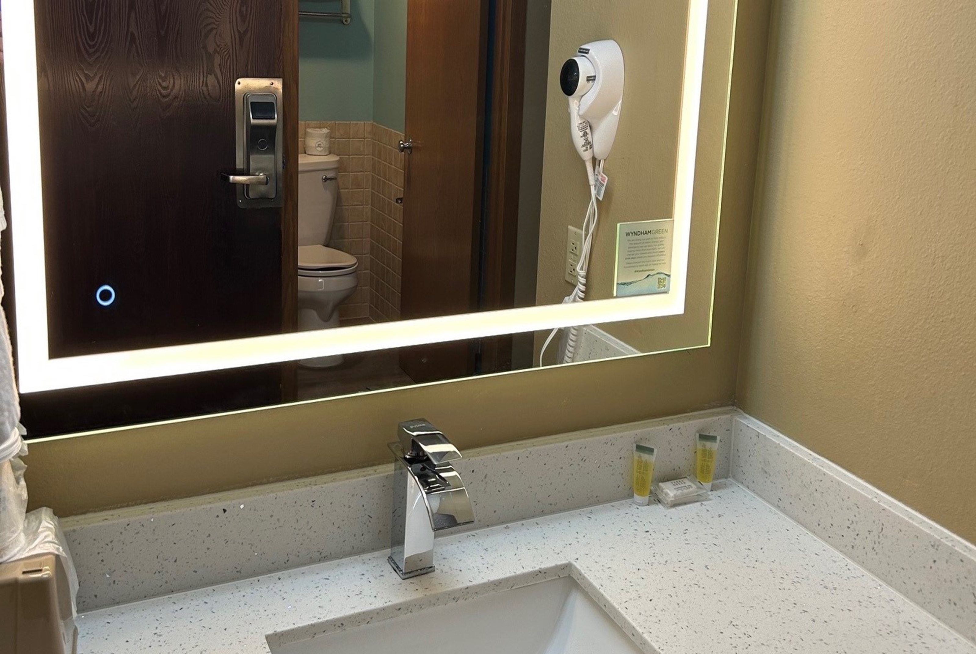 Guest room bath at the Super 8 by Wyndham Perry IA in Perry, Iowa