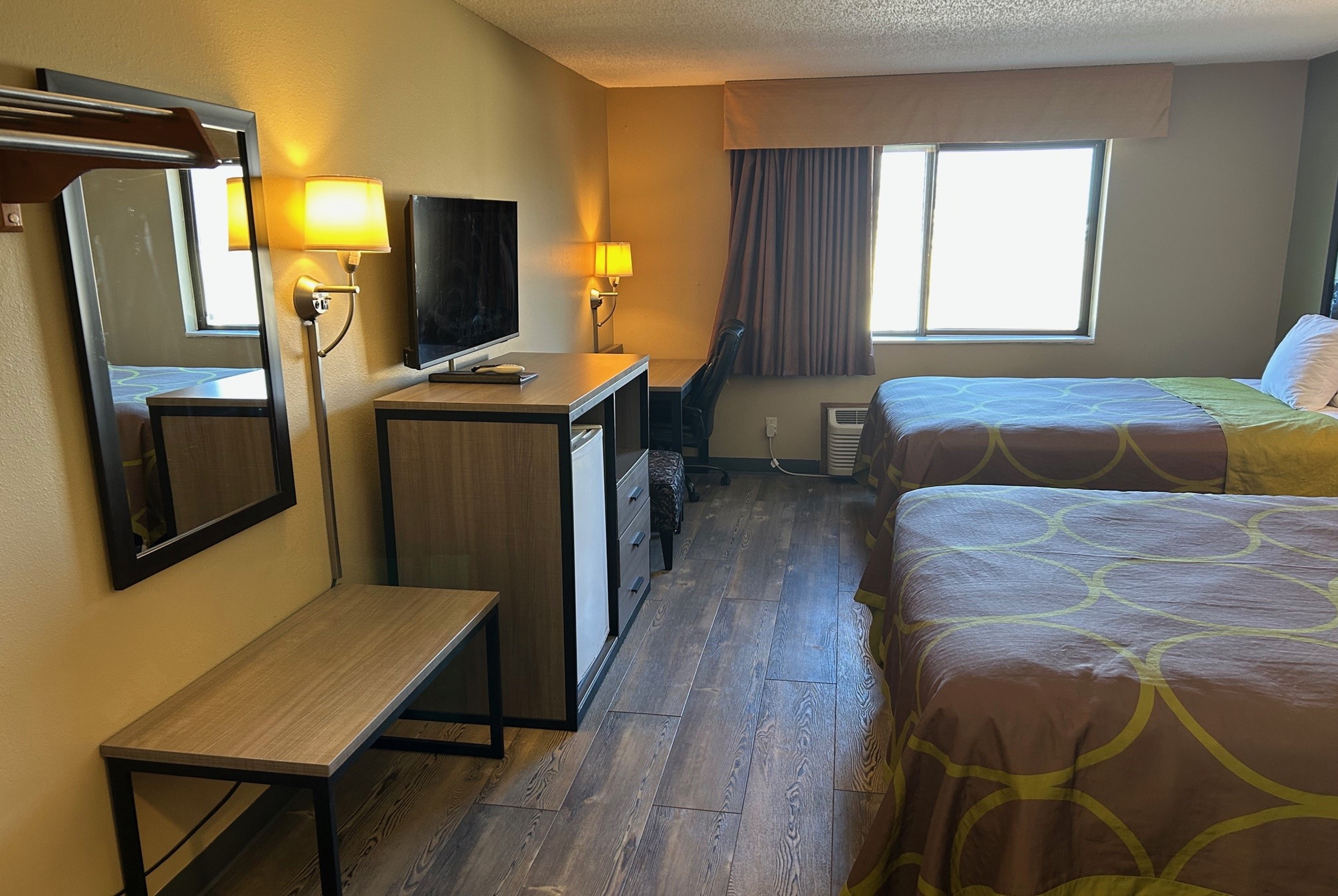 Guest room at the Super 8 by Wyndham Perry IA in Perry, Iowa