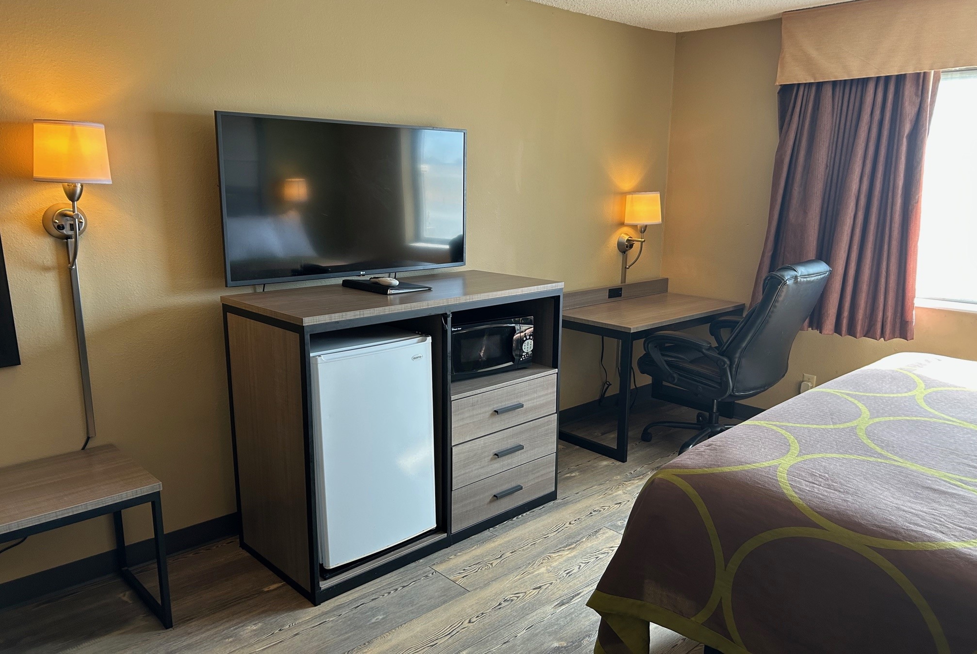 Guest room at the Super 8 by Wyndham Perry IA in Perry, Iowa