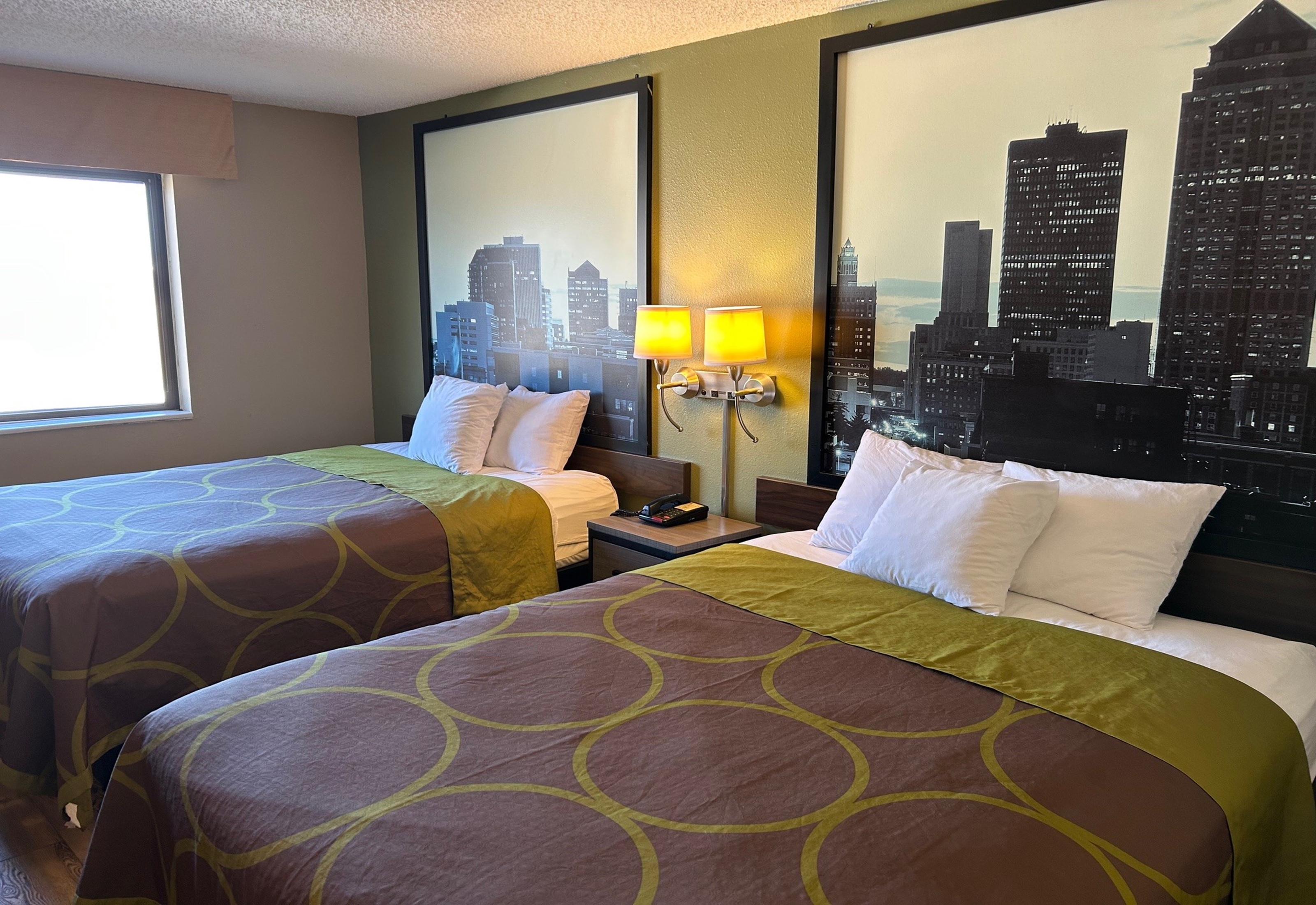 Guest room at the Super 8 by Wyndham Perry IA in Perry, Iowa