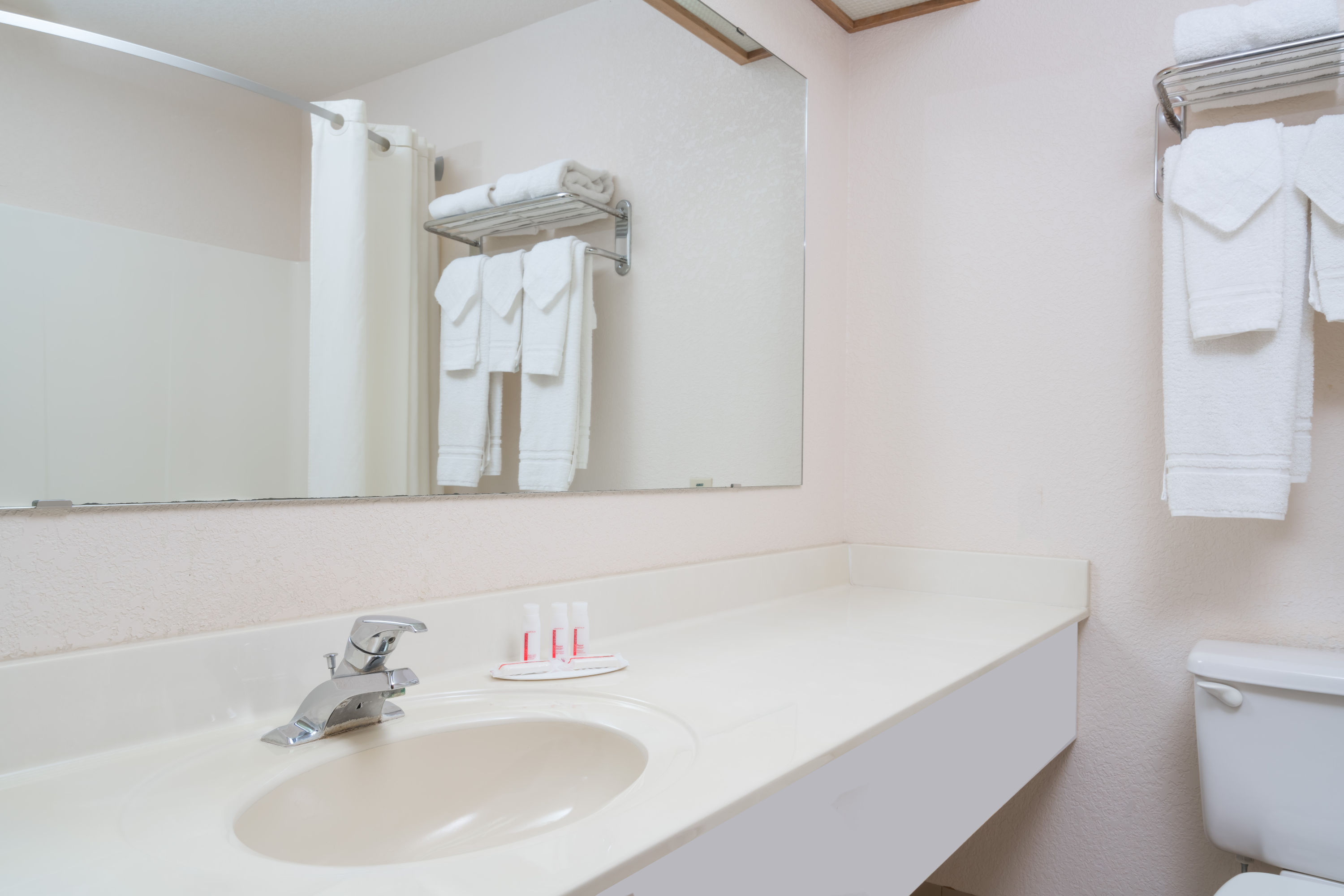 Guest room at the Super 8 by Wyndham Sheldon in Sheldon, Iowa