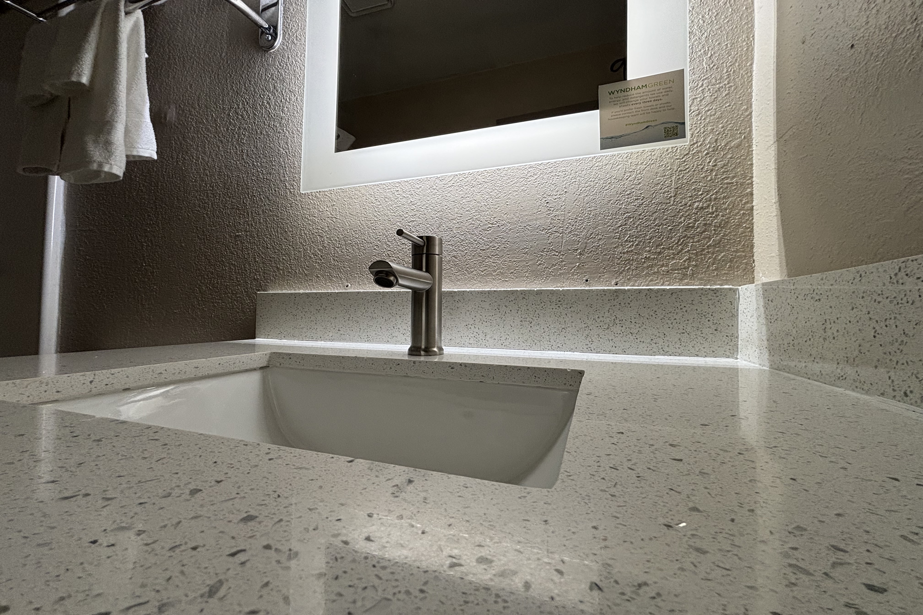 Guest room bath at the Super 8 by Wyndham Alton in Alton, Illinois