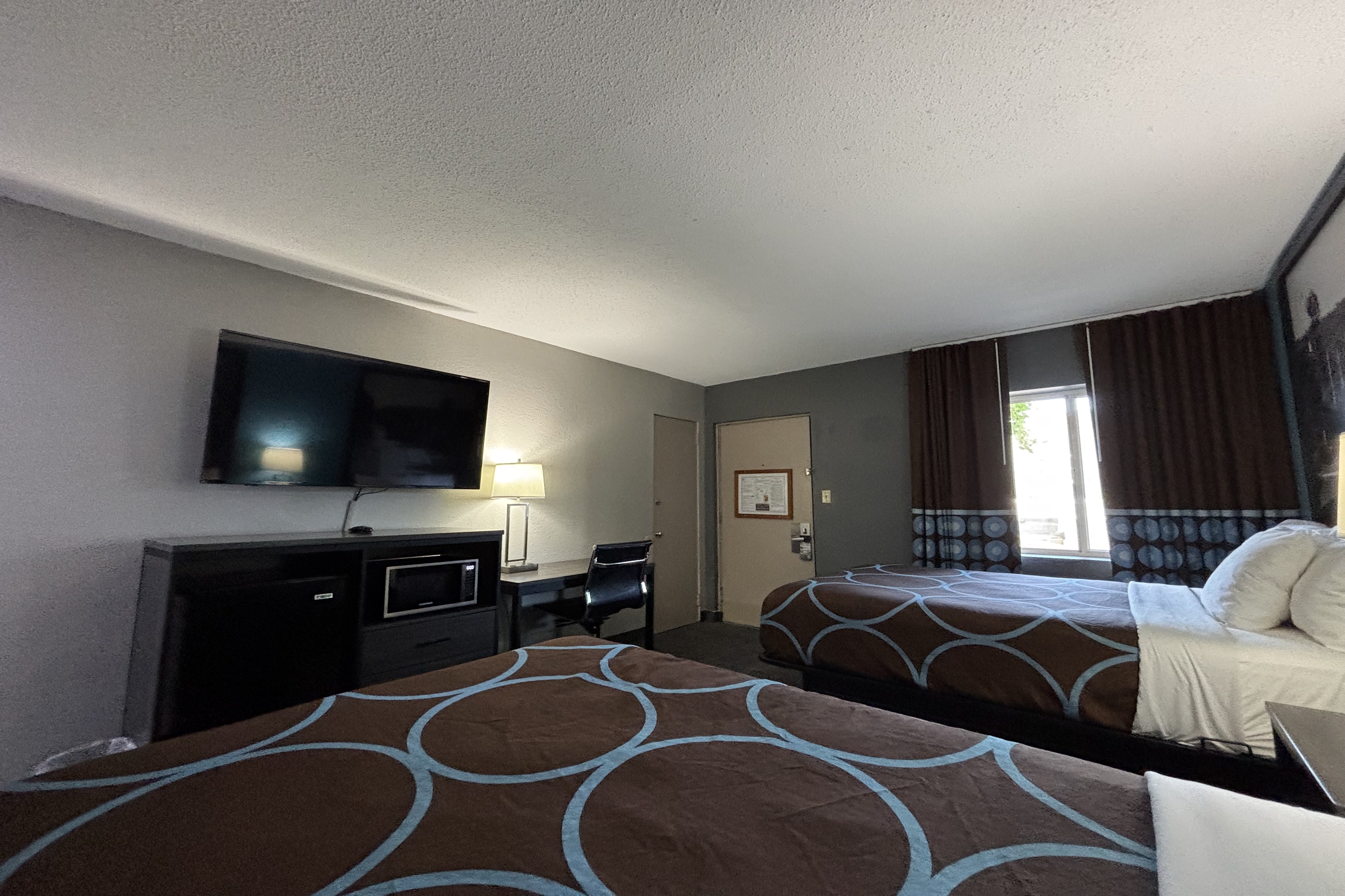 Guest room at the Super 8 by Wyndham Belleville IL/St. Louis Area in Belleville, Illinois