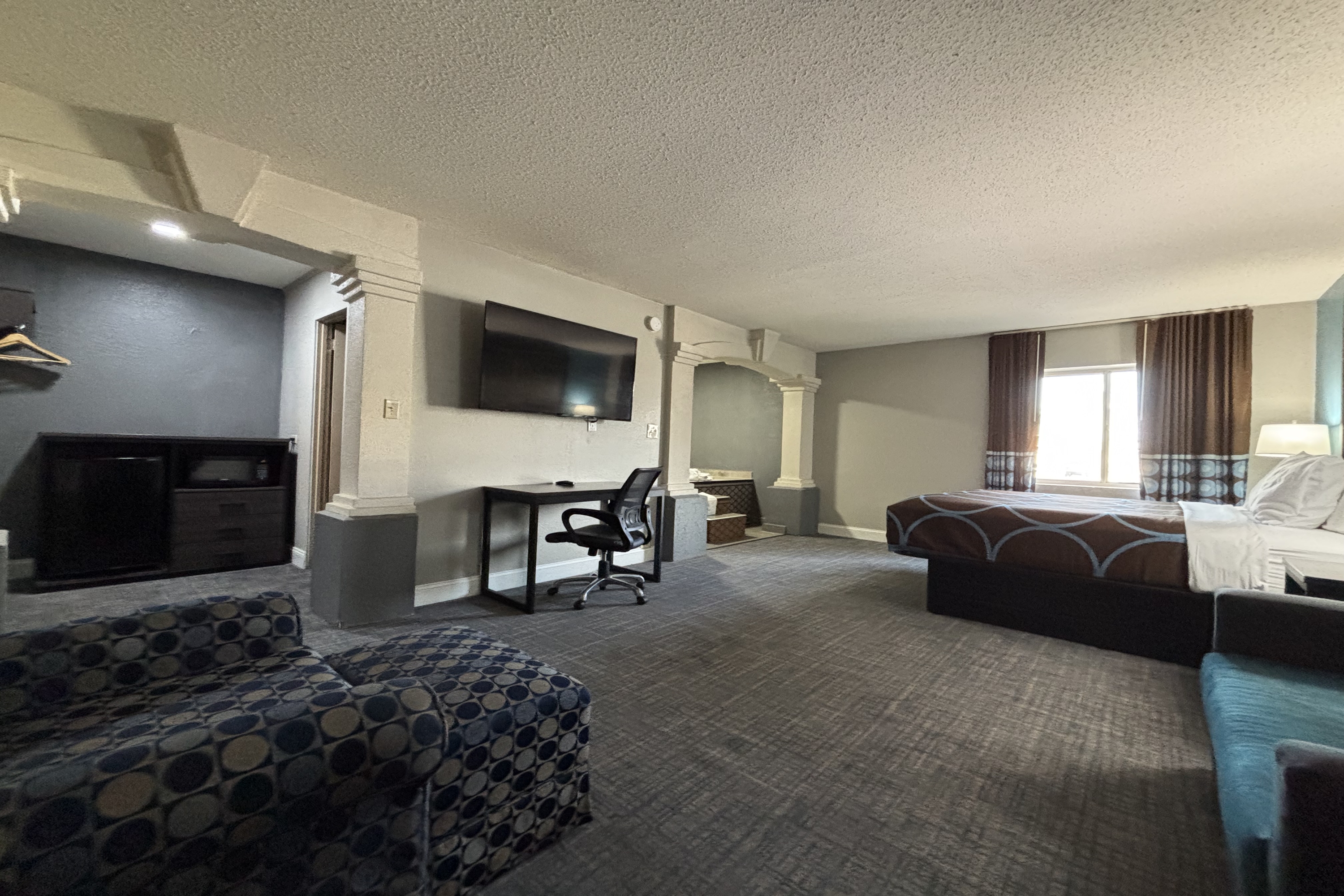 Guest room at the Super 8 by Wyndham Belleville IL/St. Louis Area in Belleville, Illinois