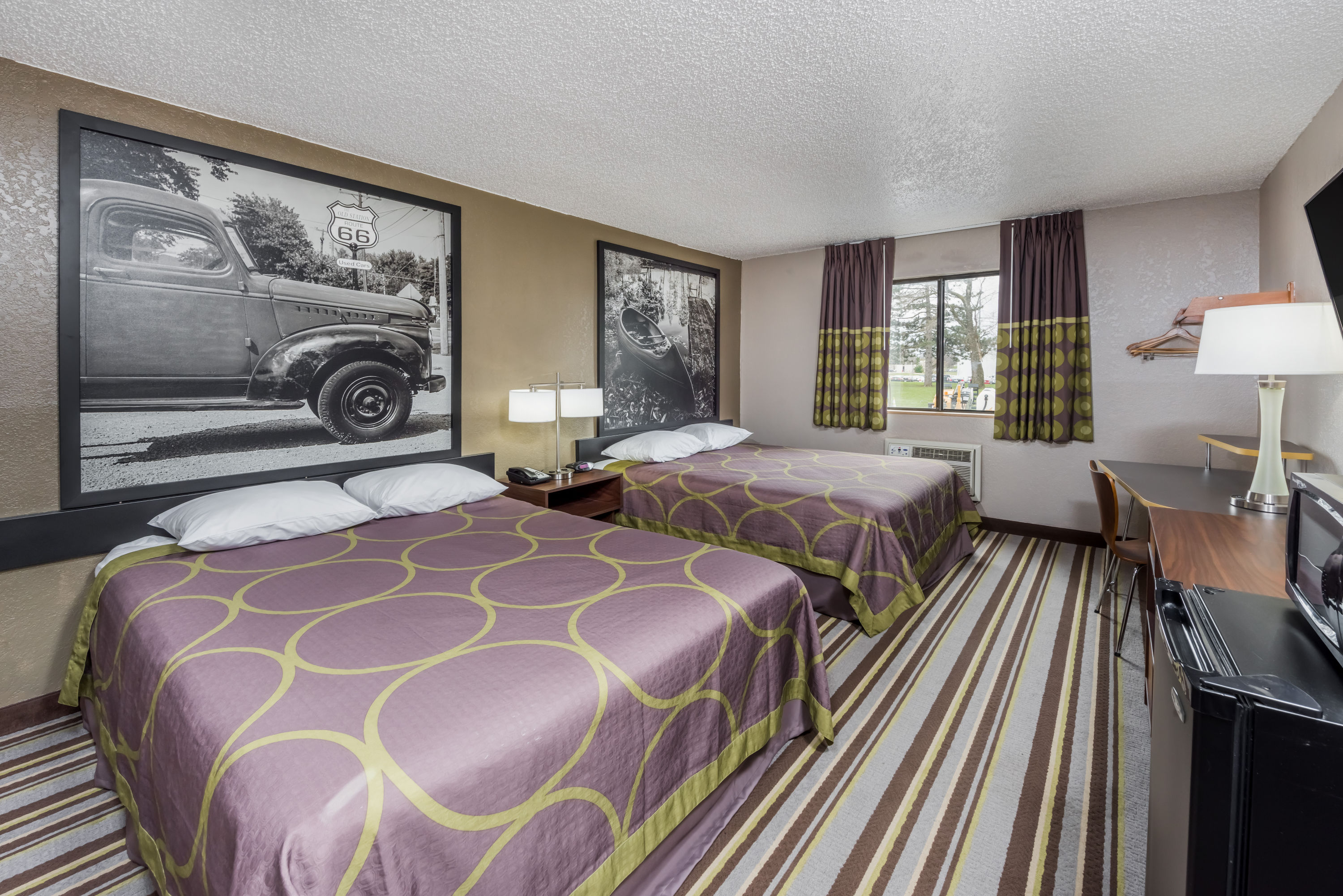 Guest room at the Super 8 by Wyndham Bloomington/Normal in Bloomington, Illinois