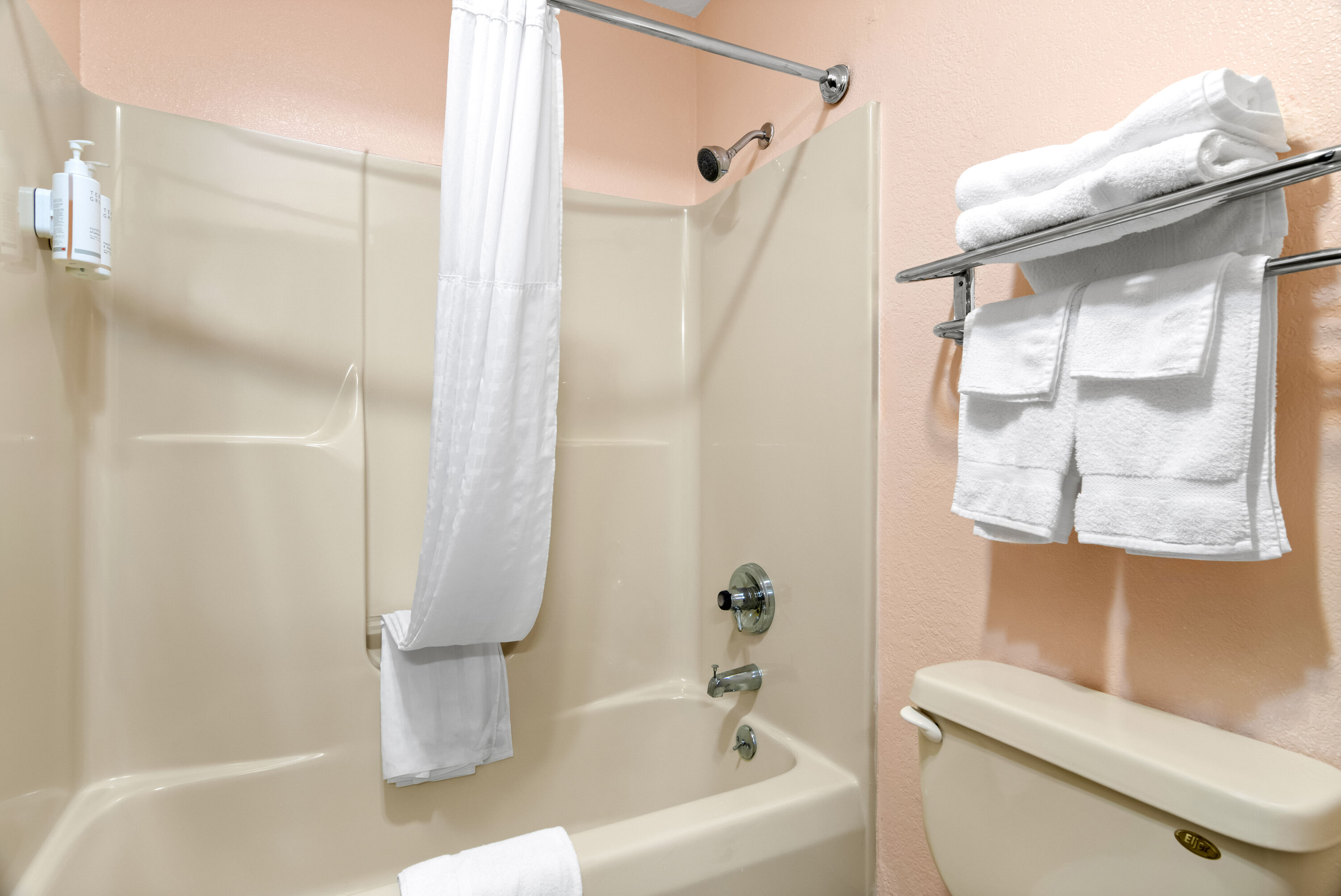 Guest room bath at the Super 8 by Wyndham Bourbonnais/Kankakee Area in Bourbonnais, Illinois