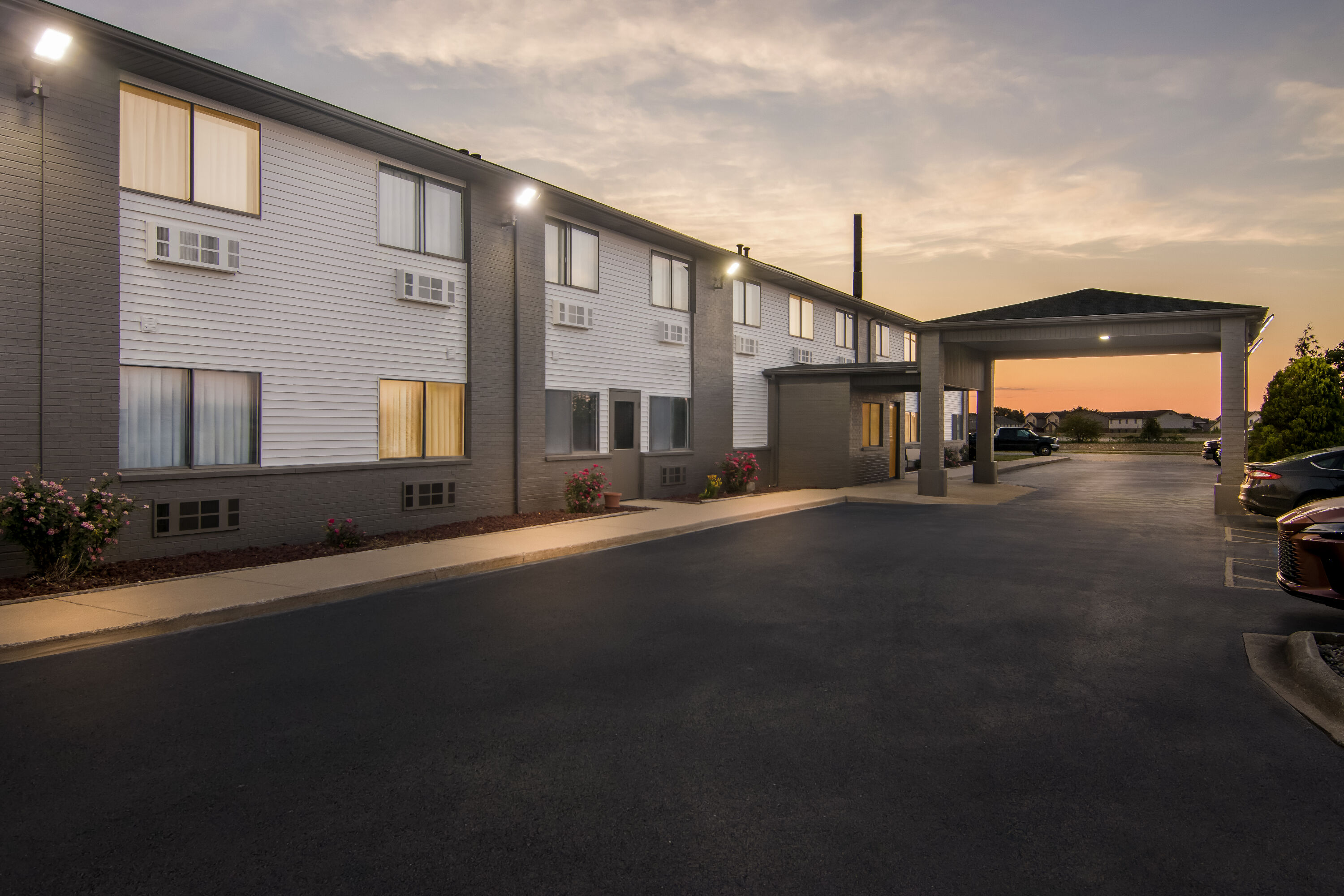 Exterior Night Image of Super 8 by Wyndham Bourbonnais/Kankakee Area hotel in Bourbonnais, Illinois