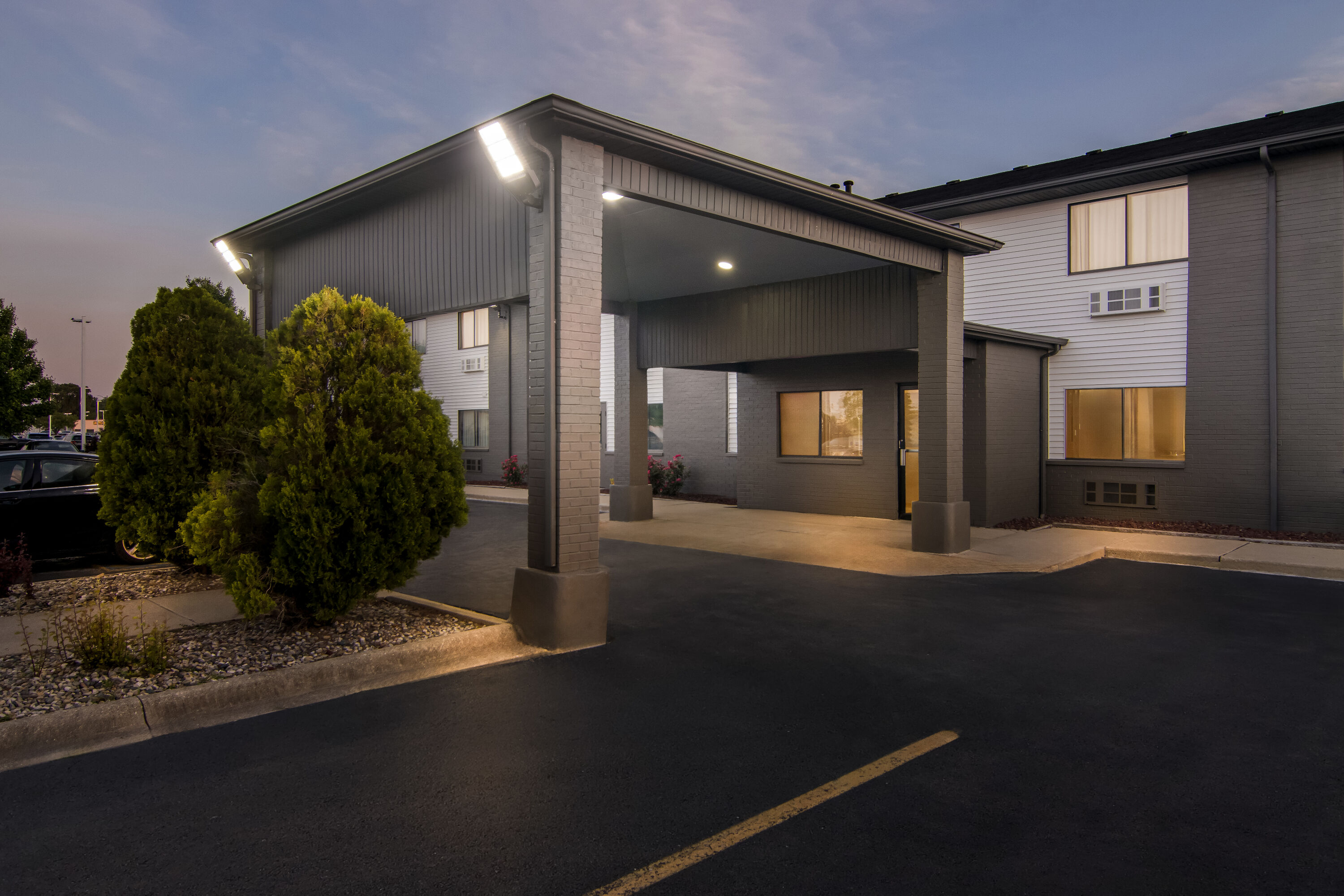 Exterior Night Image of Super 8 by Wyndham Bourbonnais/Kankakee Area hotel in Bourbonnais, Illinois