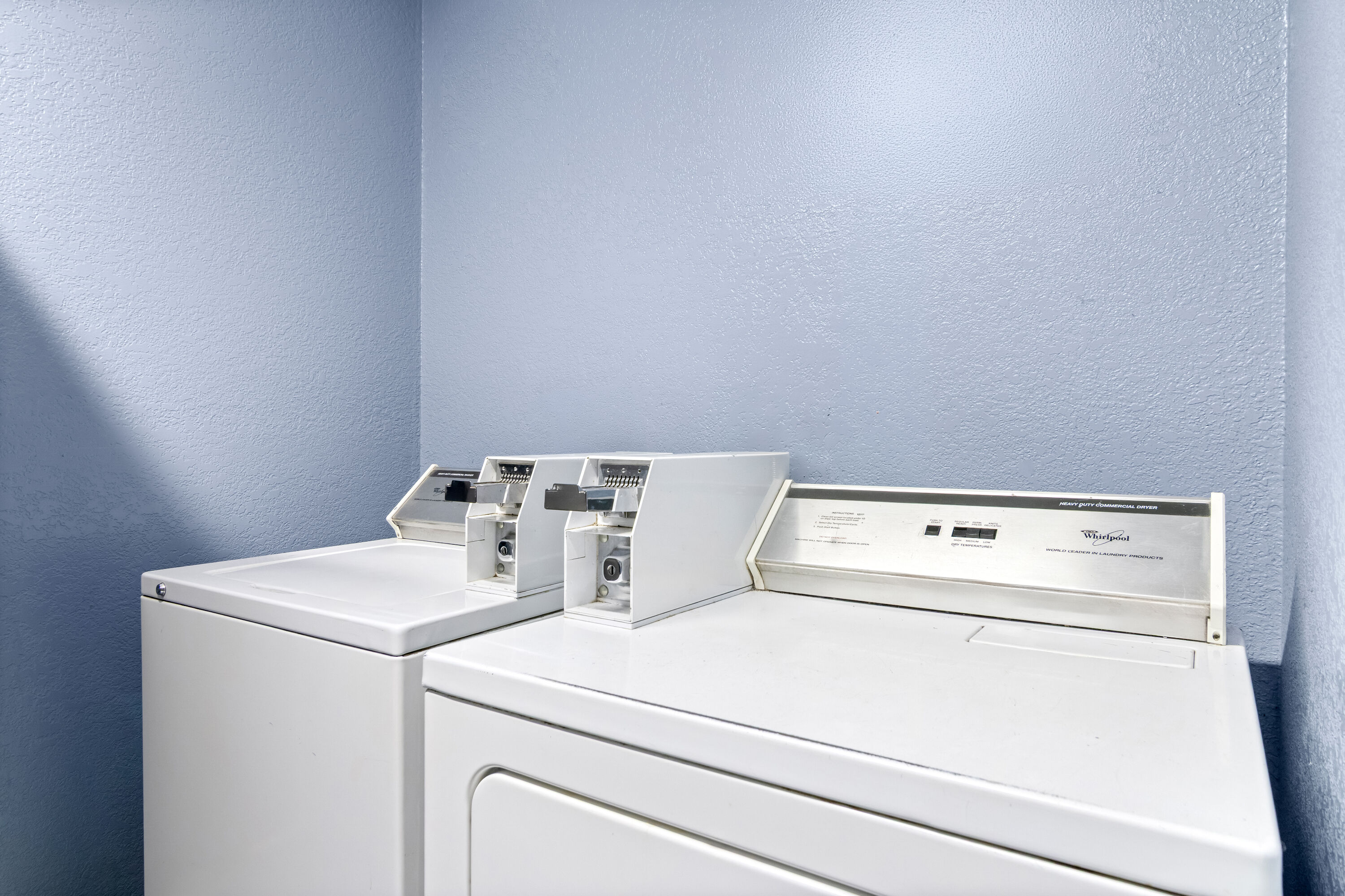 Laundry facilities at Super 8 by Wyndham Bourbonnais/Kankakee Area in Bourbonnais, Illinois