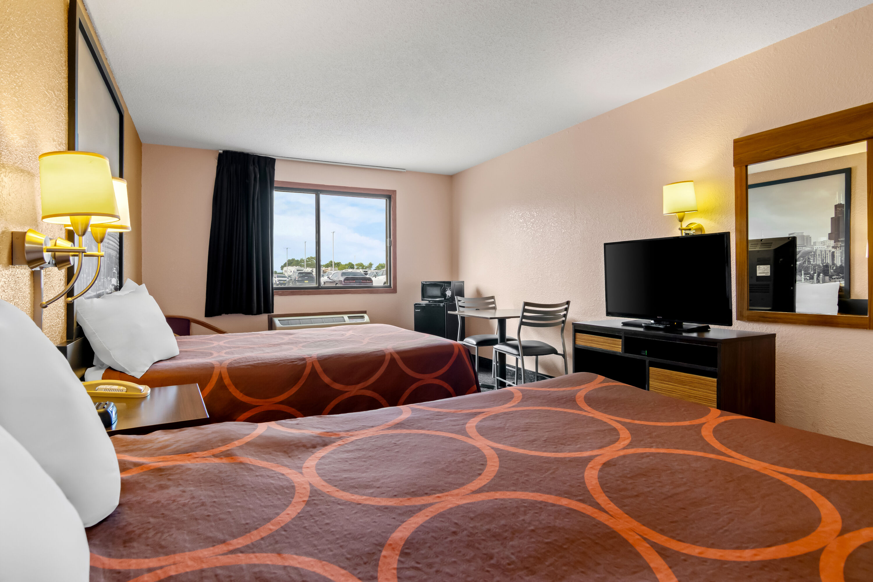 Double bed guest room at the Super 8 by Wyndham Bourbonnais/Kankakee Area in Bourbonnais, Illinois