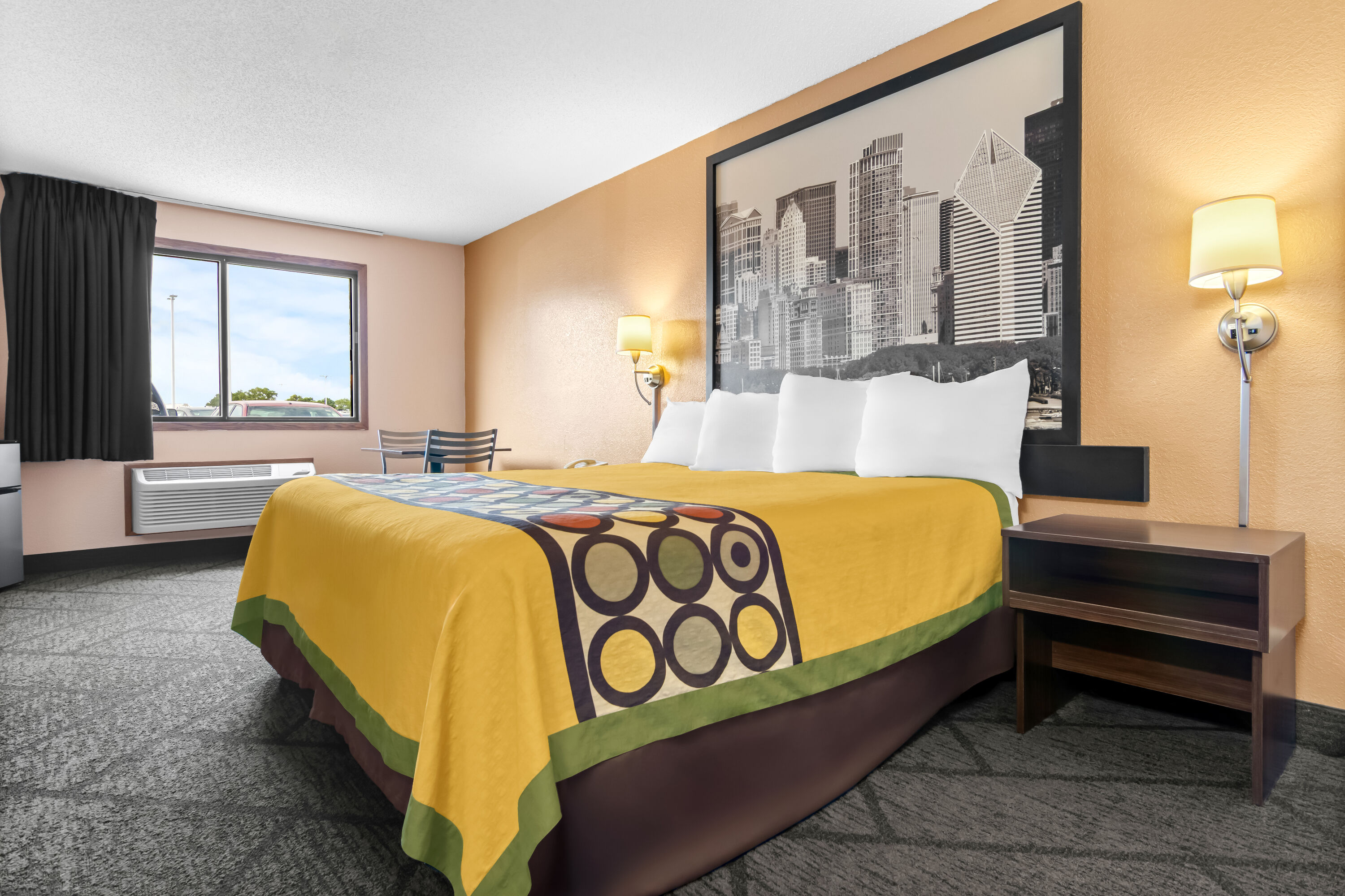 King bed guest room at the Super 8 by Wyndham Bourbonnais/Kankakee Area in Bourbonnais, Illinois