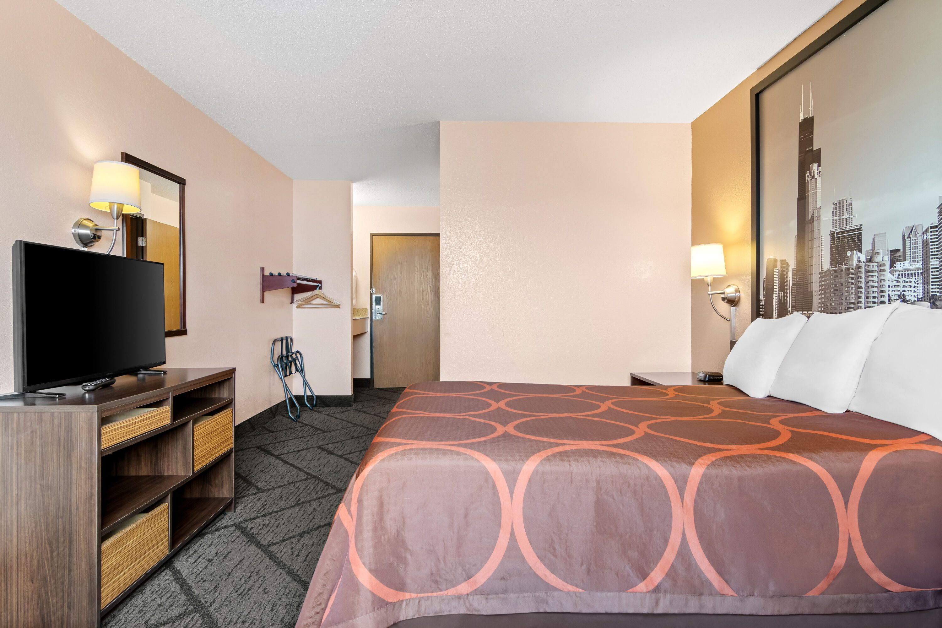 Queen bed guest room at the Super 8 by Wyndham Bourbonnais/Kankakee Area in Bourbonnais, Illinois