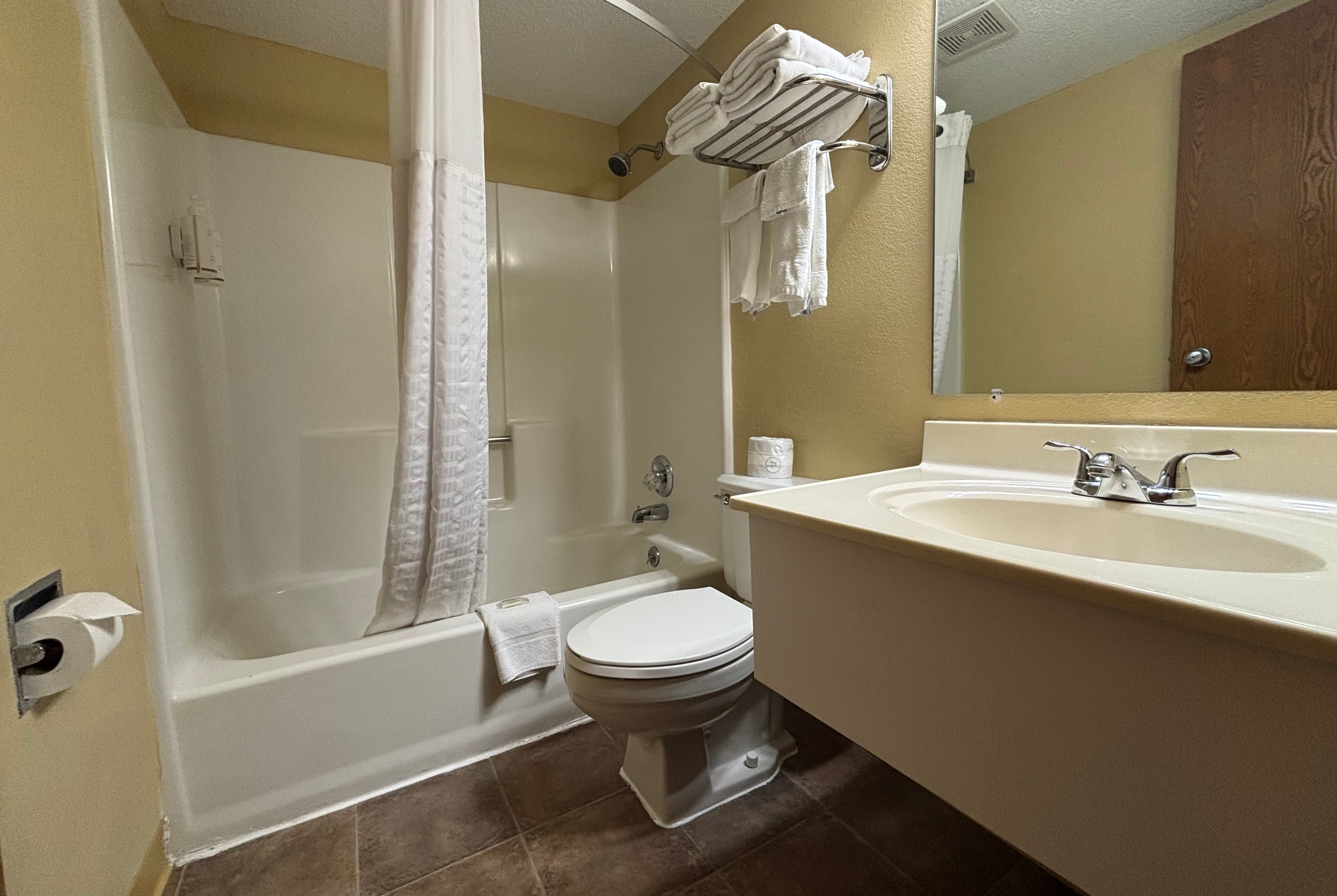 Guest room bath at the Super 8 by Wyndham Carbondale in Carbondale, Illinois